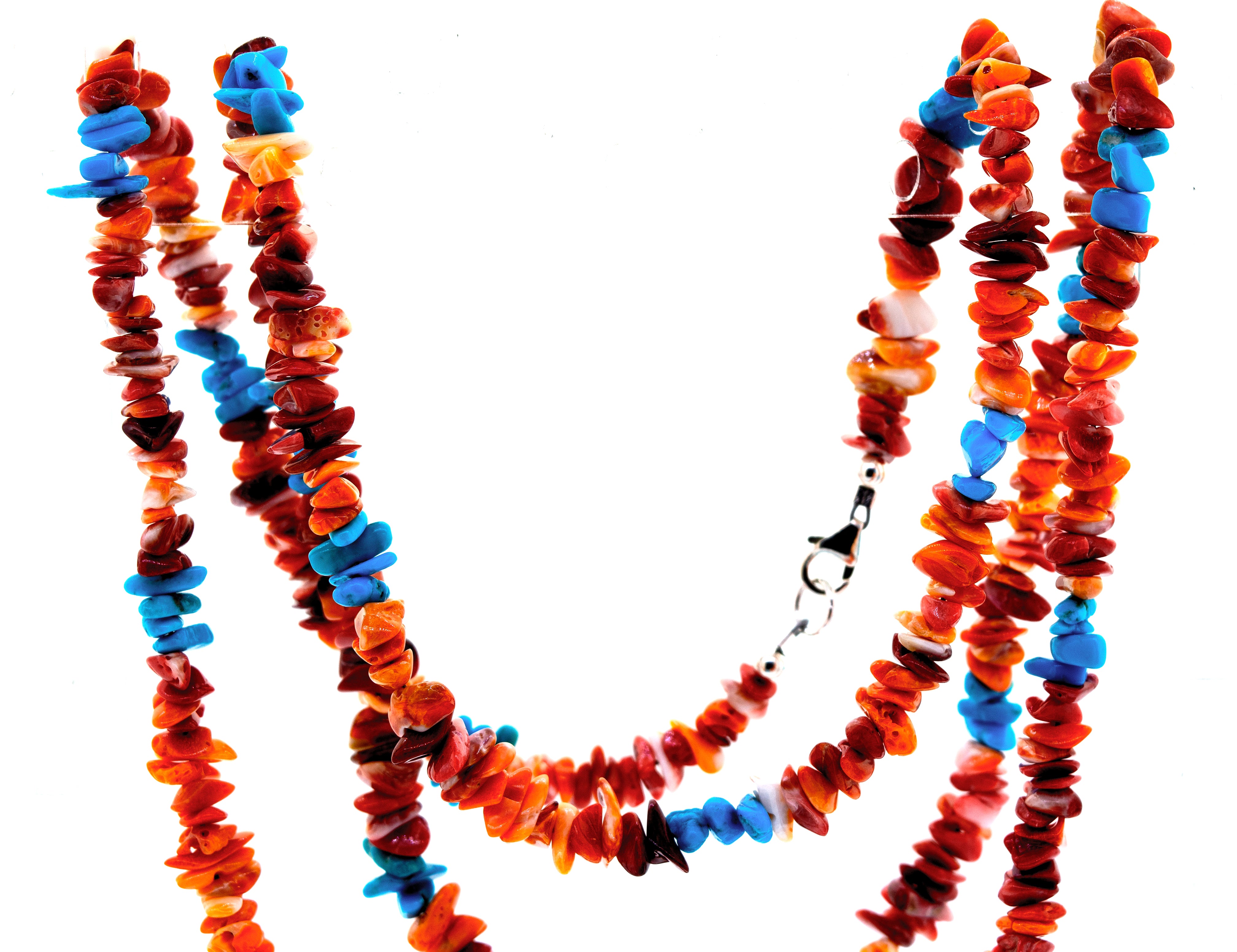 A long Super Silver necklace adorned with colorful stones made of Handmade Spiny Oyster Shell and Turquoise.