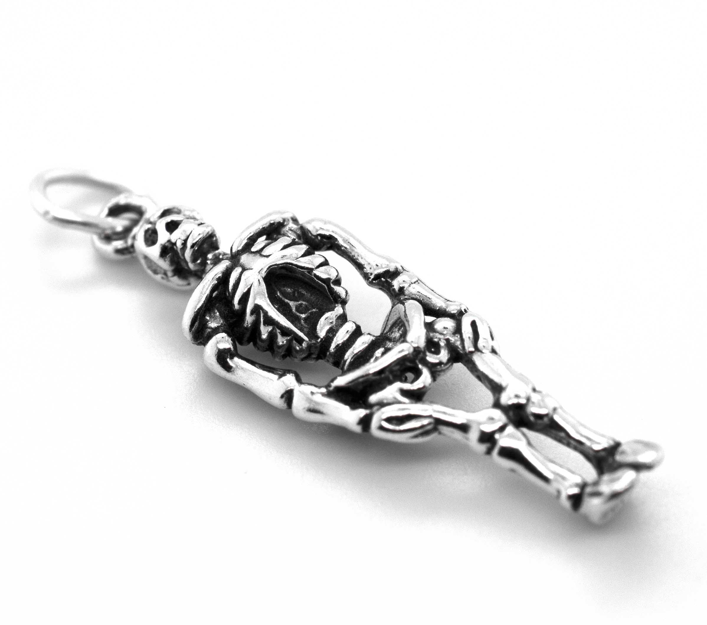 A Super Silver Small Skeleton Charm on a white background.