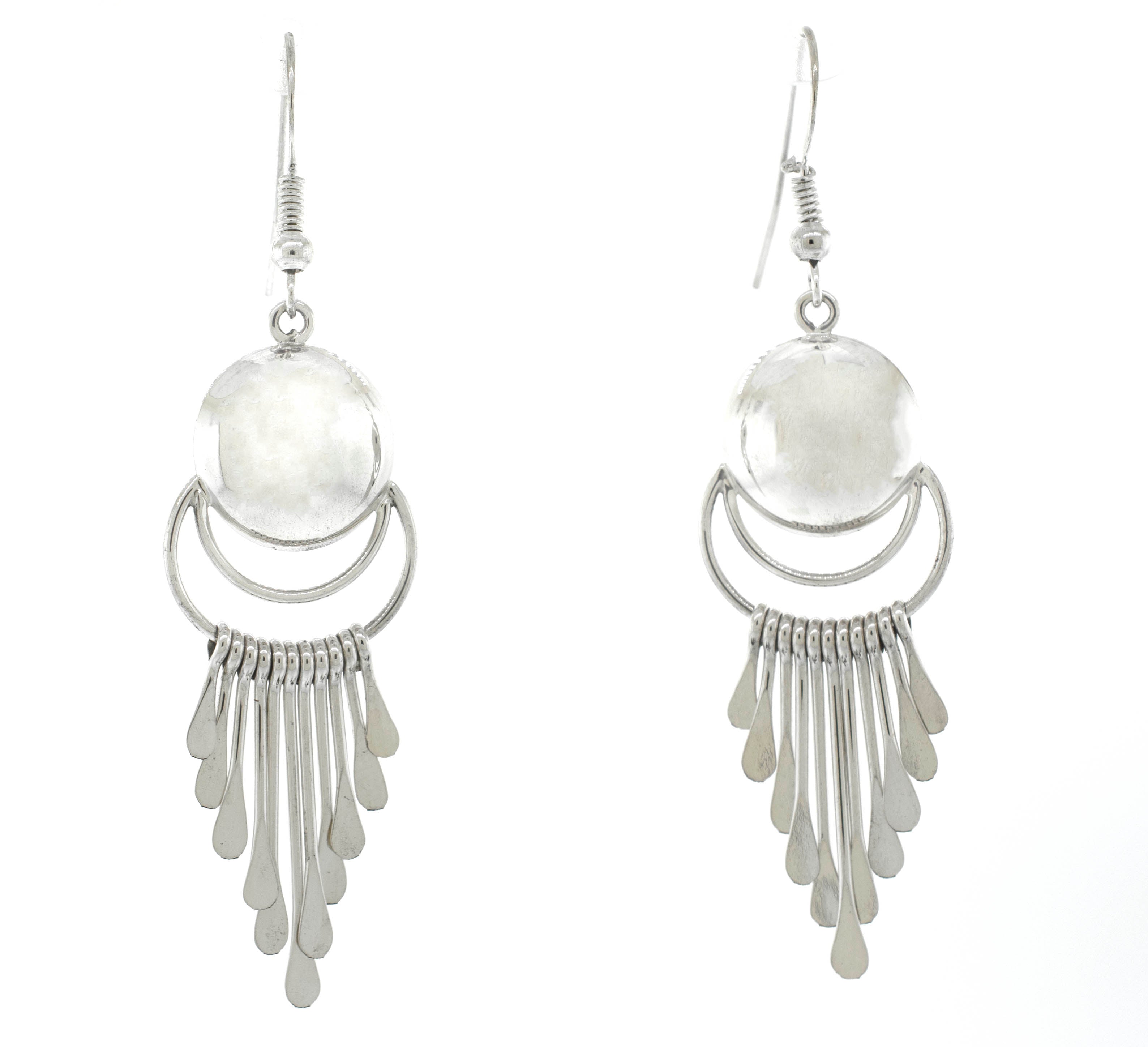 A pair of Stunning Navajo Chandelier Earrings by Super Silver with a white stone.