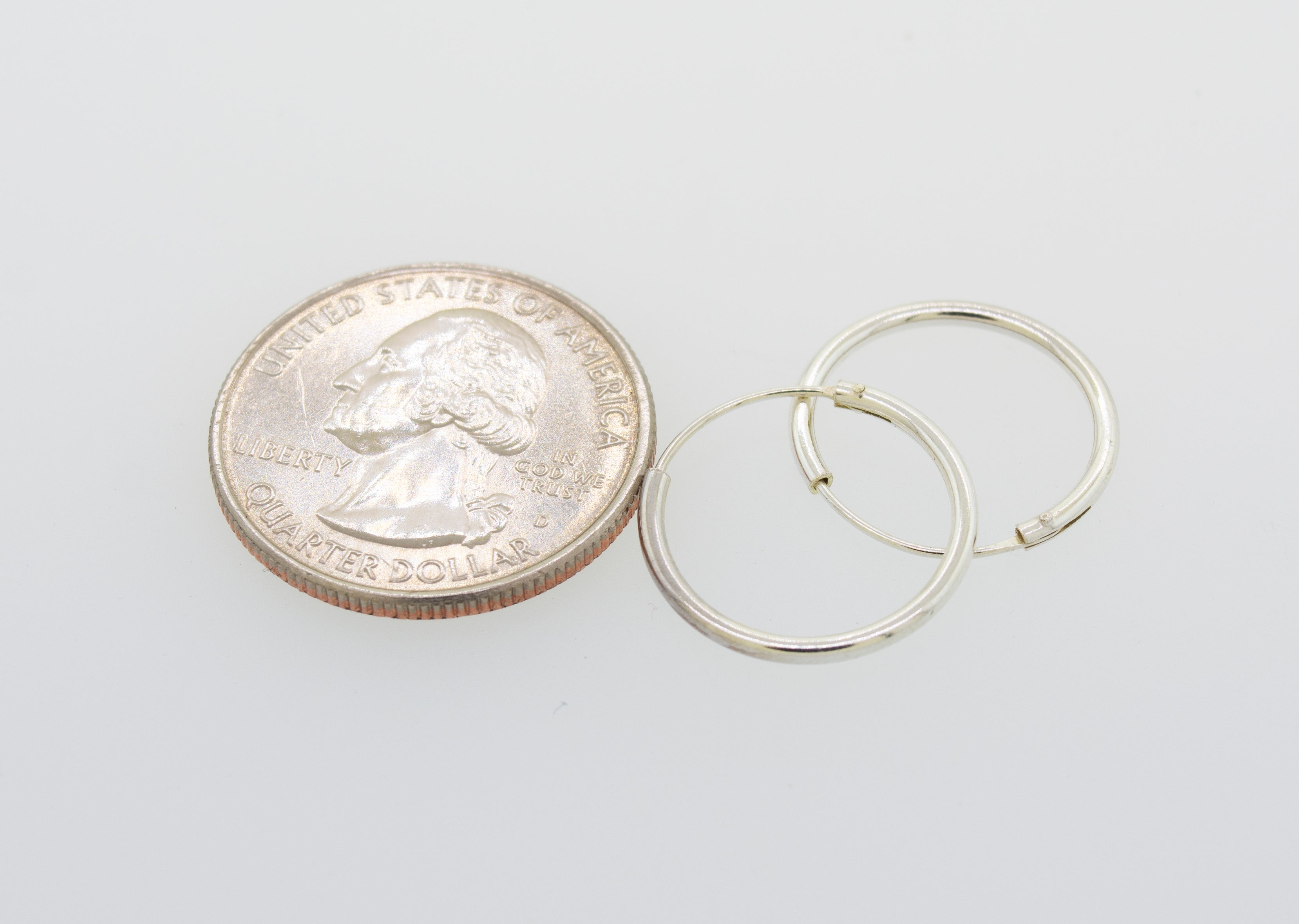 A pair of Super Silver Silver Infinity Hoops 1mm X 17.5mm, perfect for everyday use.