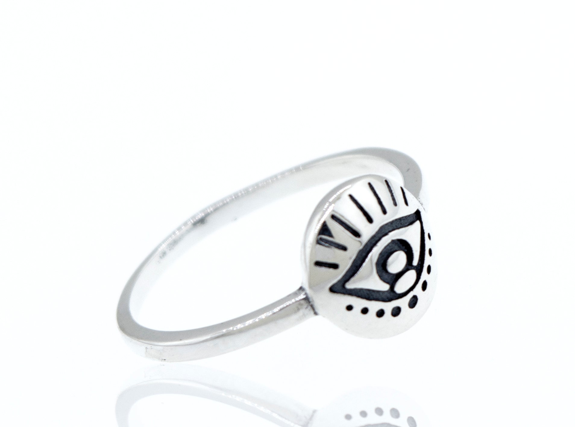 A minimalist silver All Seeing Evil Eye Ring with an eye on it.
