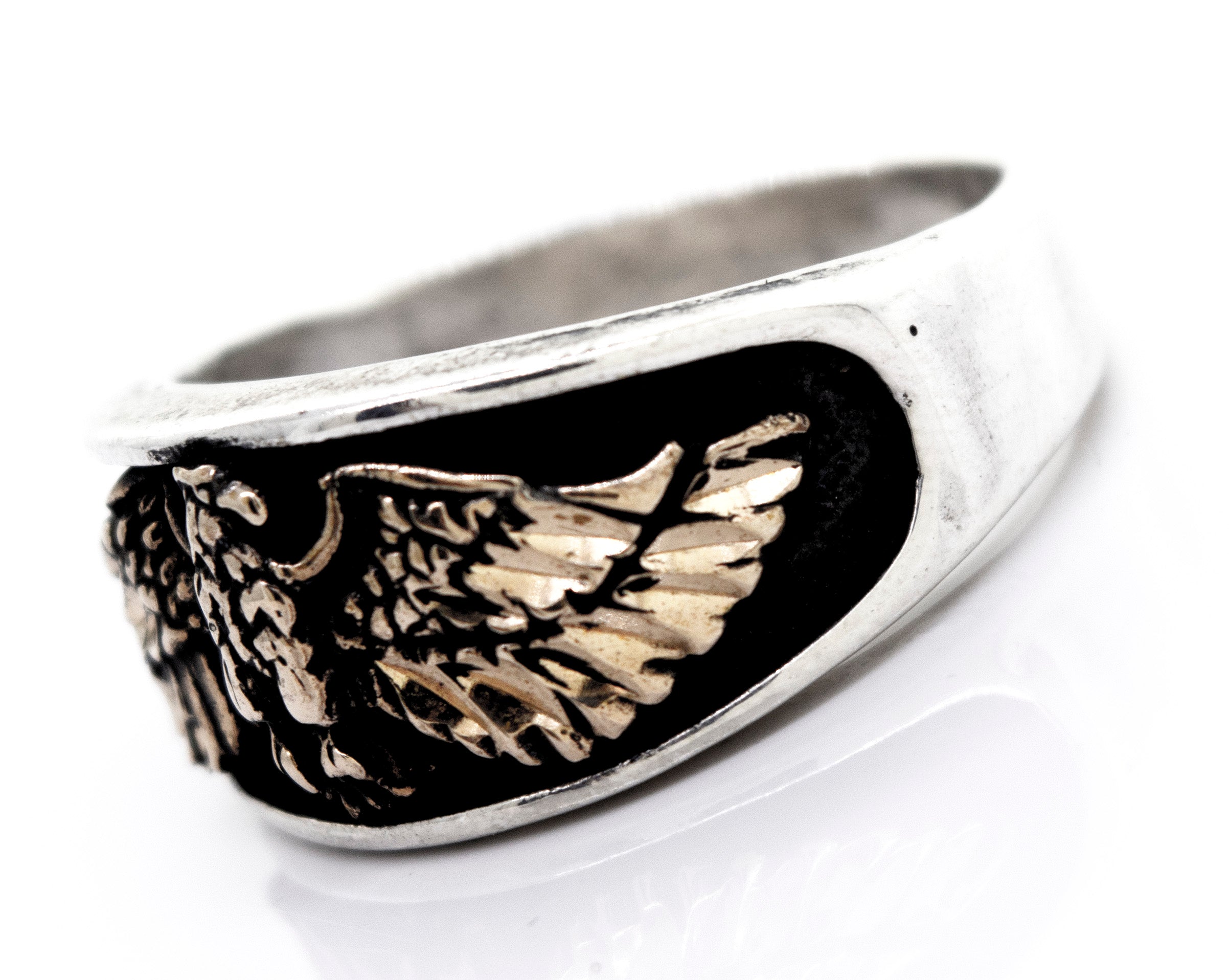A Super Silver silver band with a American Made Heavy Eagle Ring With Bronze design, handcrafted in America.