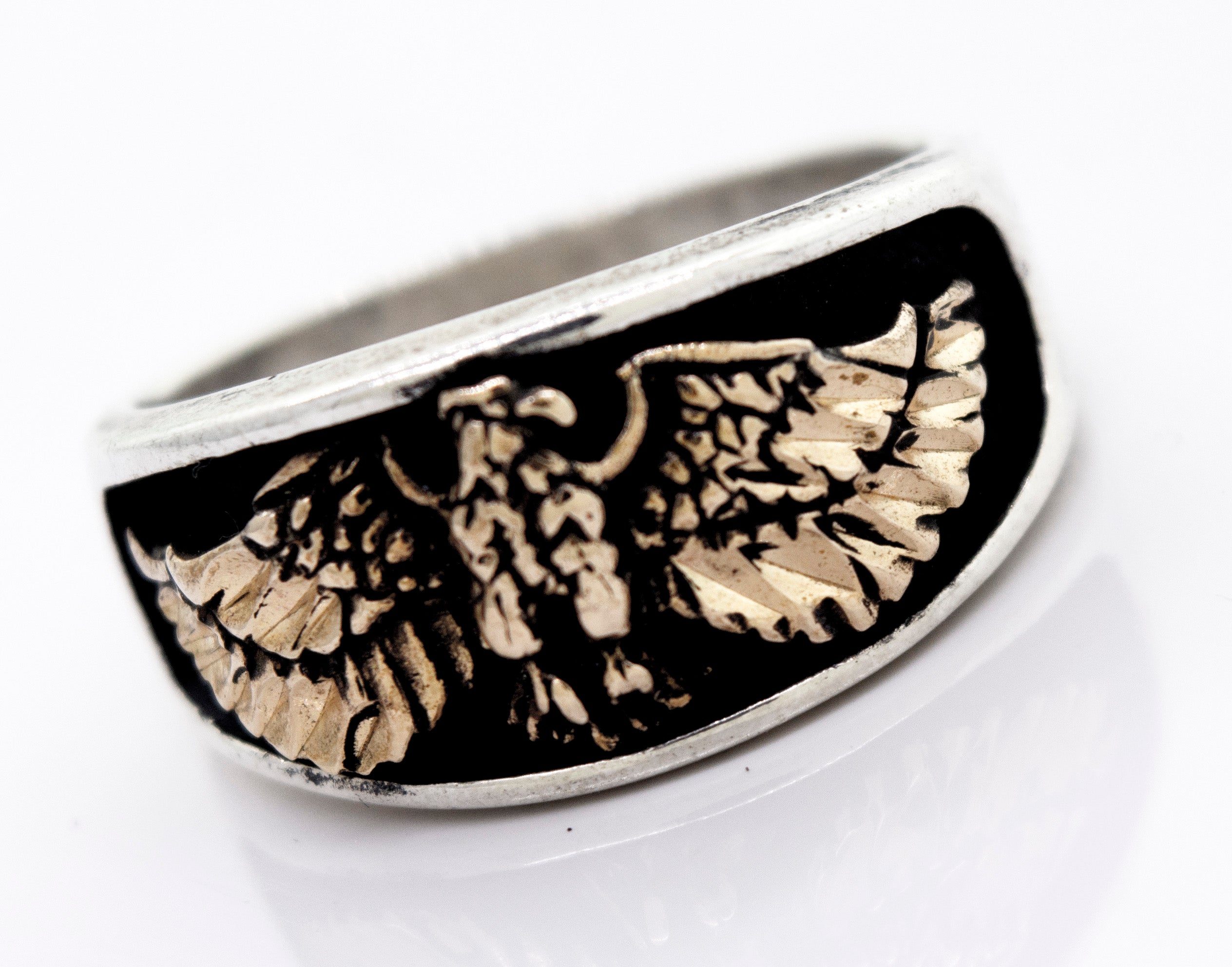 A Super Silver American Made Heavy Eagle Ring With Bronze.