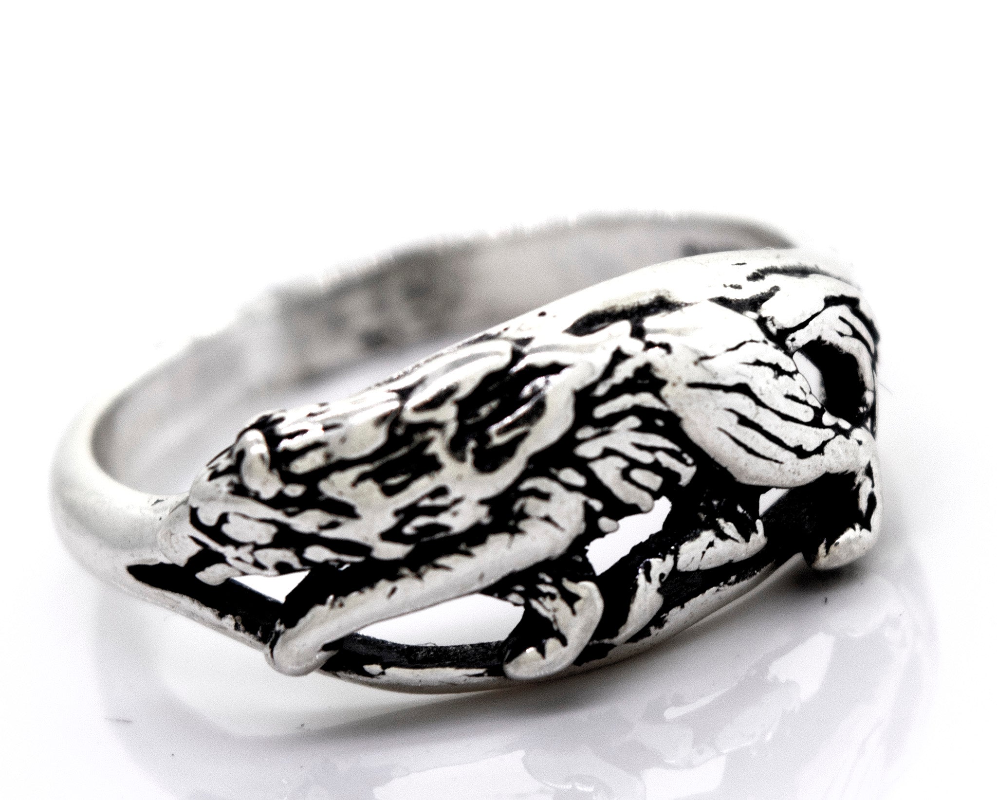 An American Made Prowling Wolf Ring from Super Silver, with an oxidized sterling silver design.