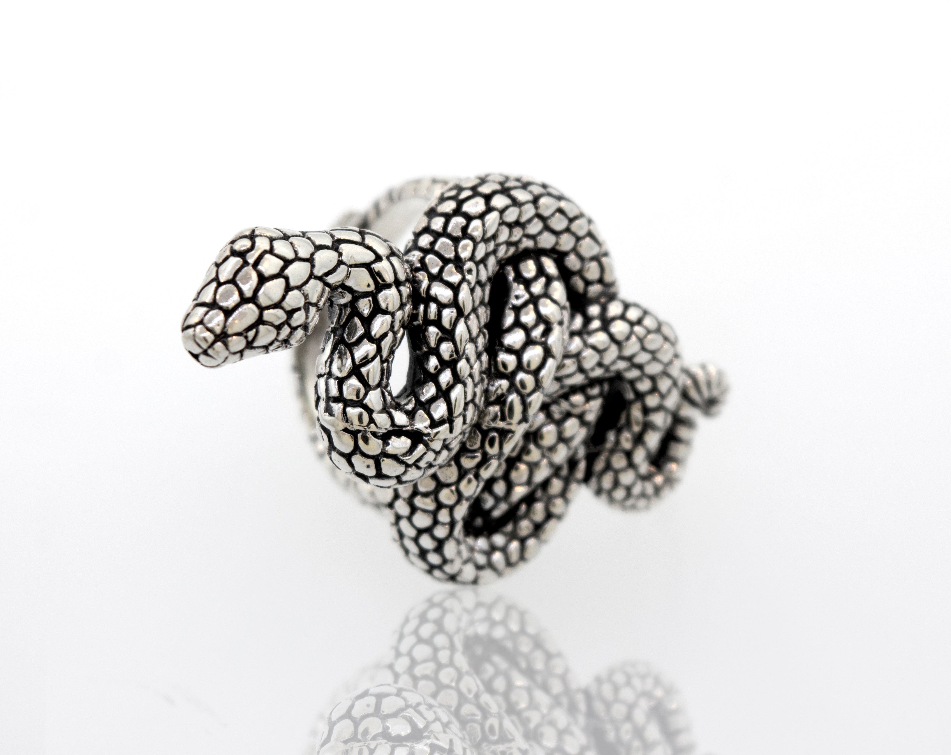 A Coiled Snake Ring with an adjustable band, slithering serpent design, on a white surface. Brand: Super Silver.