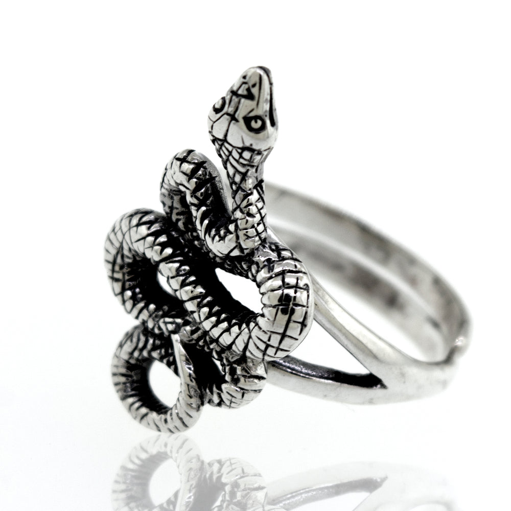 
                  
                    A sterling silver Compelling Snake Ring with a snake design.
                  
                