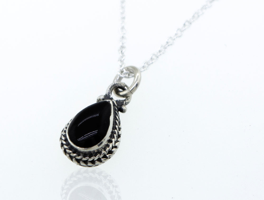 A Onyx Teardrop Necklace inlaid with black onyx on a 925 Sterling Silver chain by Super Silver.