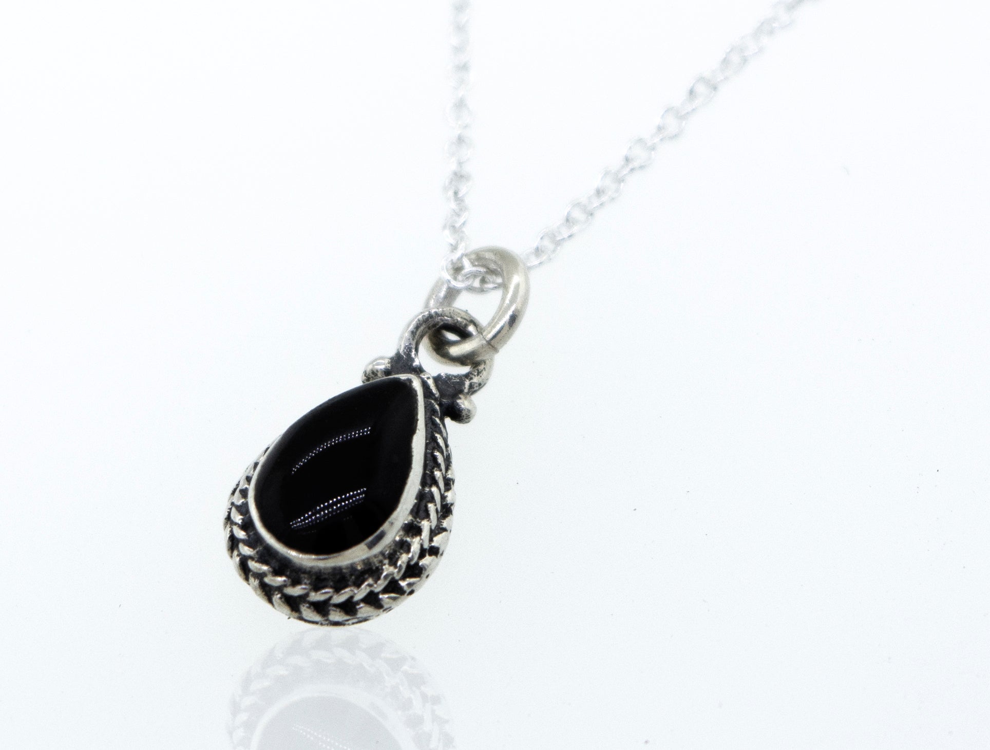 A Onyx Teardrop Necklace inlaid with black onyx on a 925 Sterling Silver chain by Super Silver.
