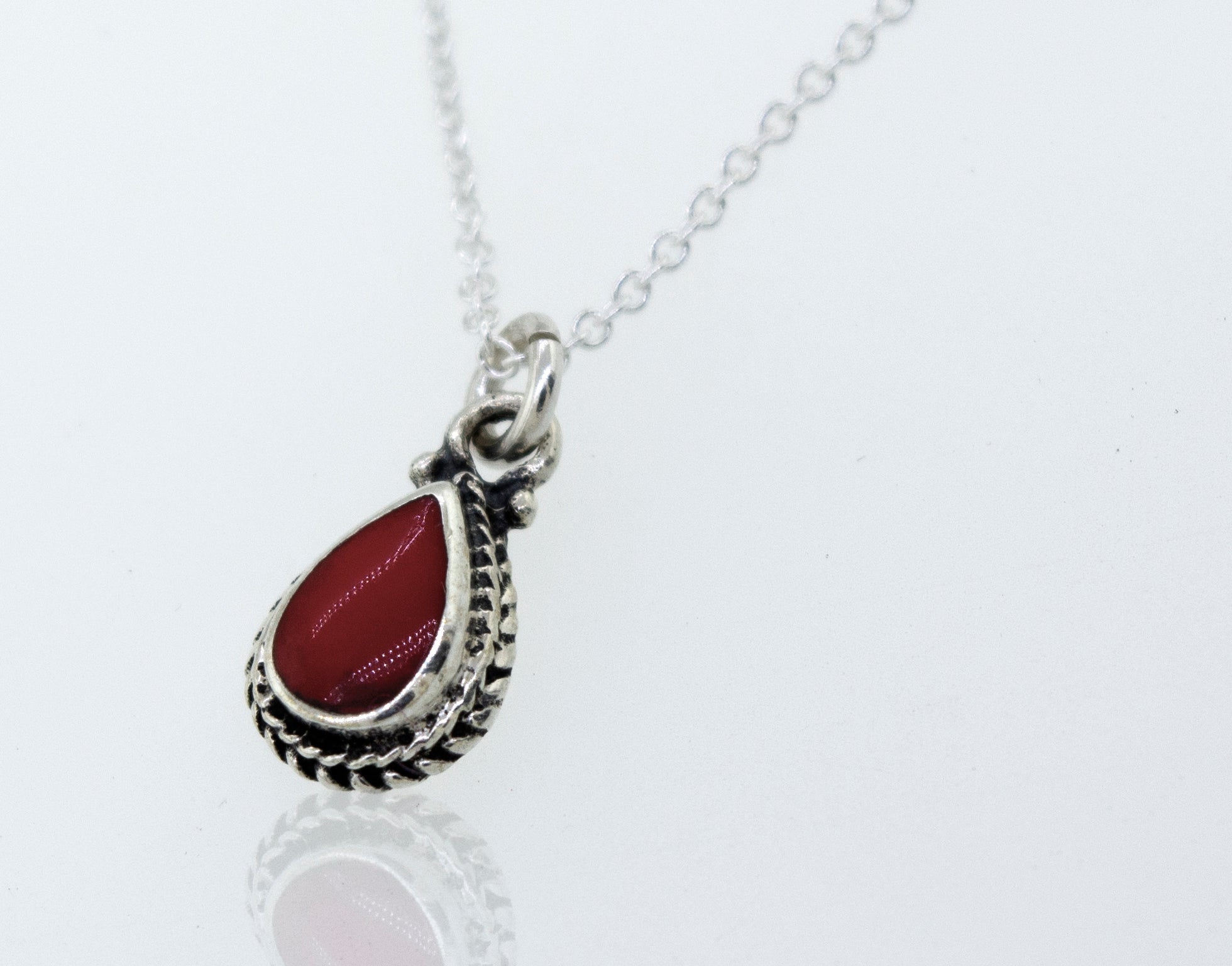 A Super Silver Coral Teardrop Necklace.