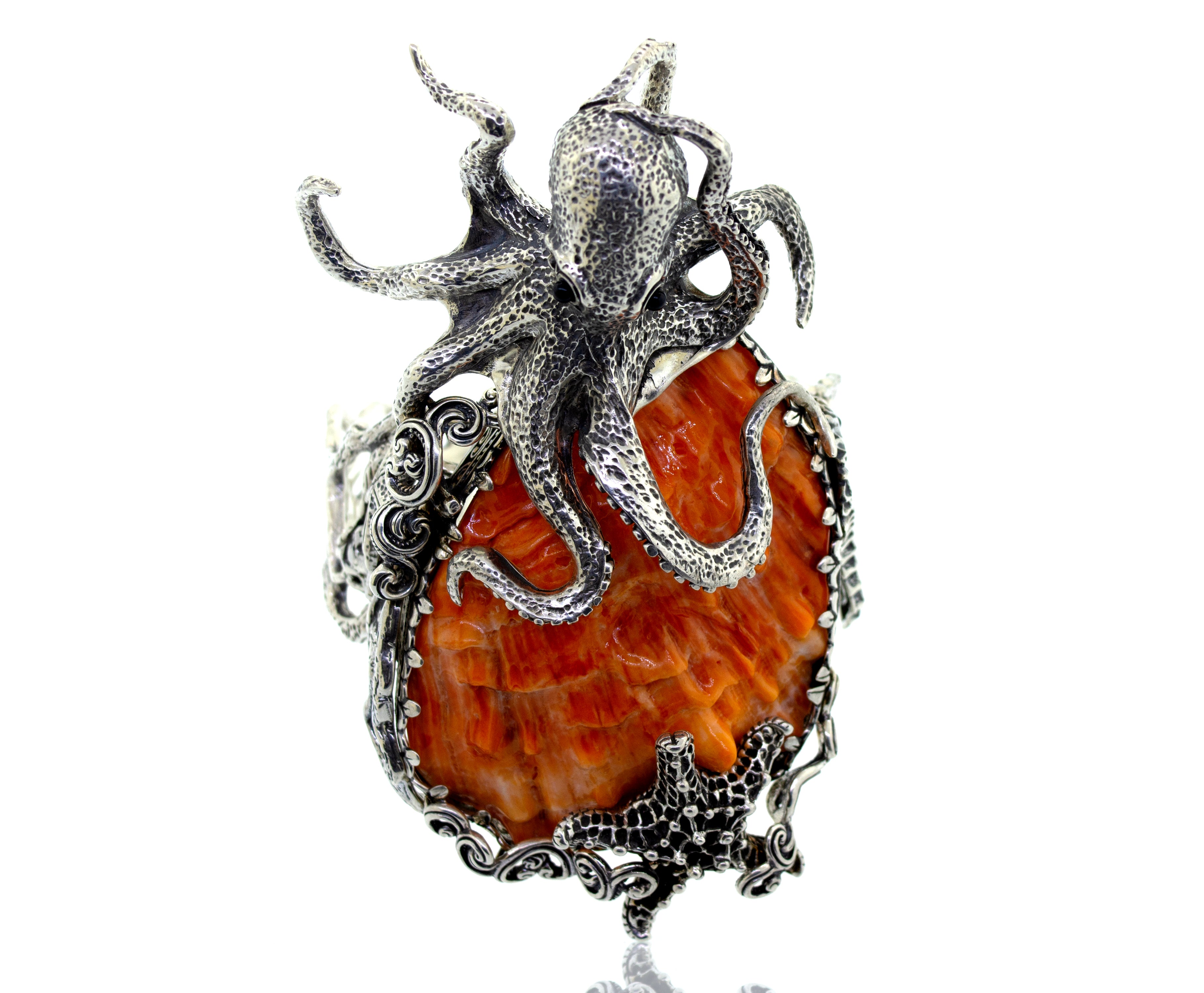 A Handcrafted Spiny Shell Designer Cuff Bracelet by Super Silver, with an ocean life design, featuring a spiny oyster shell octopus.