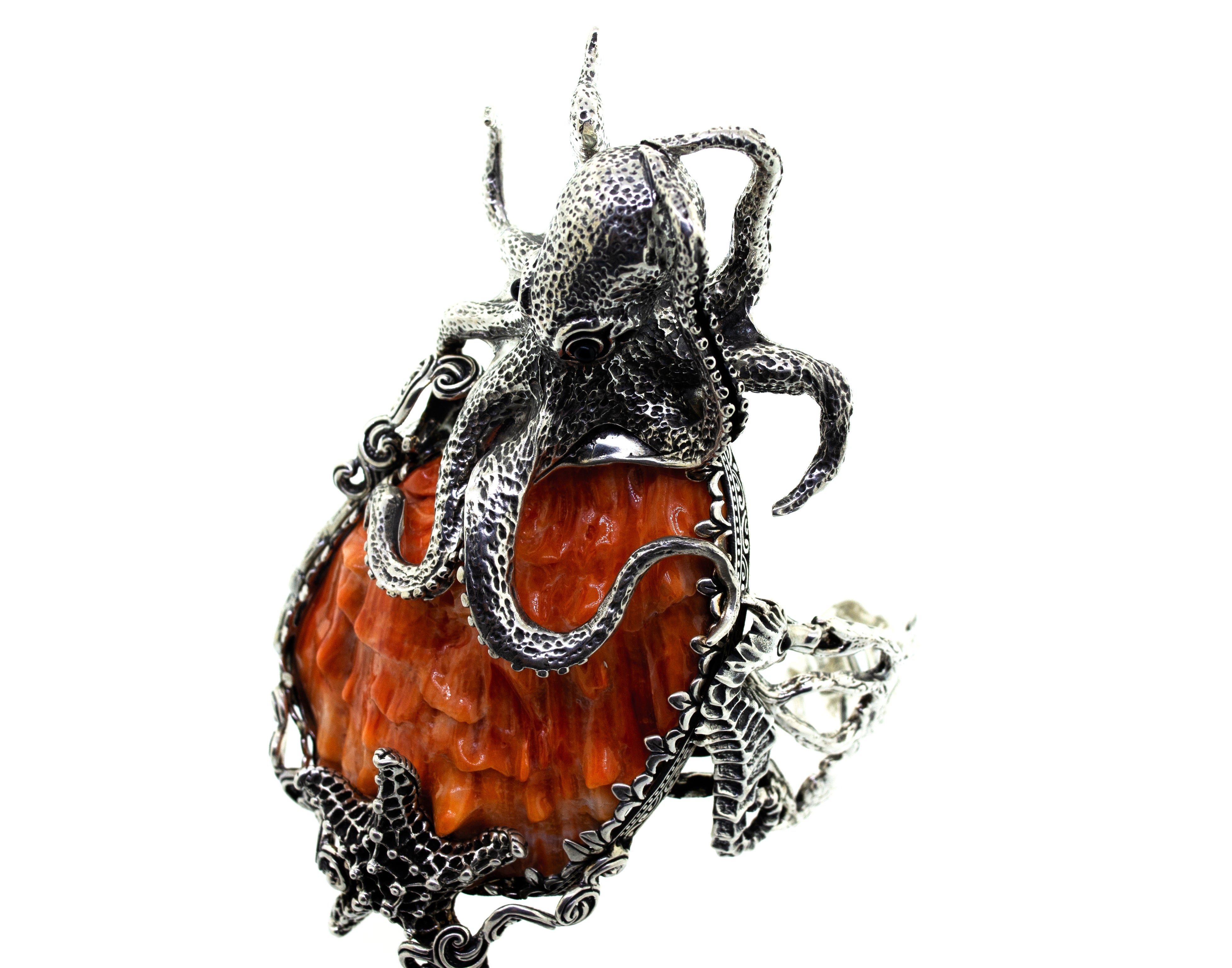 A Handcrafted Spiny Shell Designer Cuff Bracelet with a sterling silver starfish on it from Super Silver.