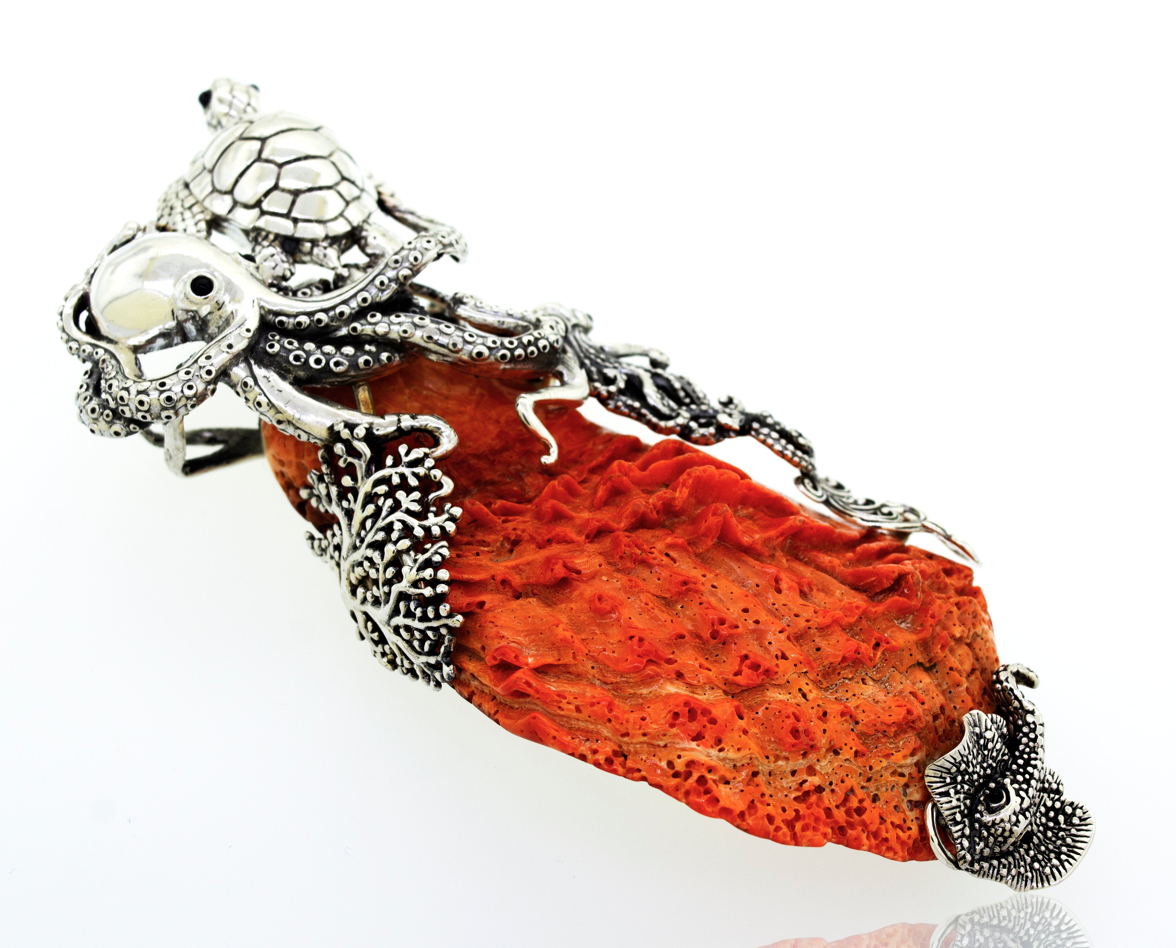 A Super Silver Handcrafted Spiny Shell Designer Pendant adorned with an orange coral and pearls, inspired by ocean life design.