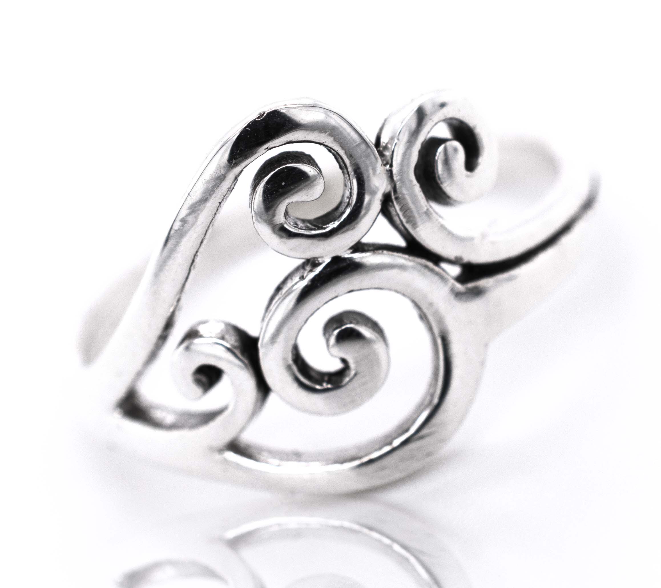 A Simple Swirl Design Ring with a spiral design, perfect for everyday wear, from Super Silver.