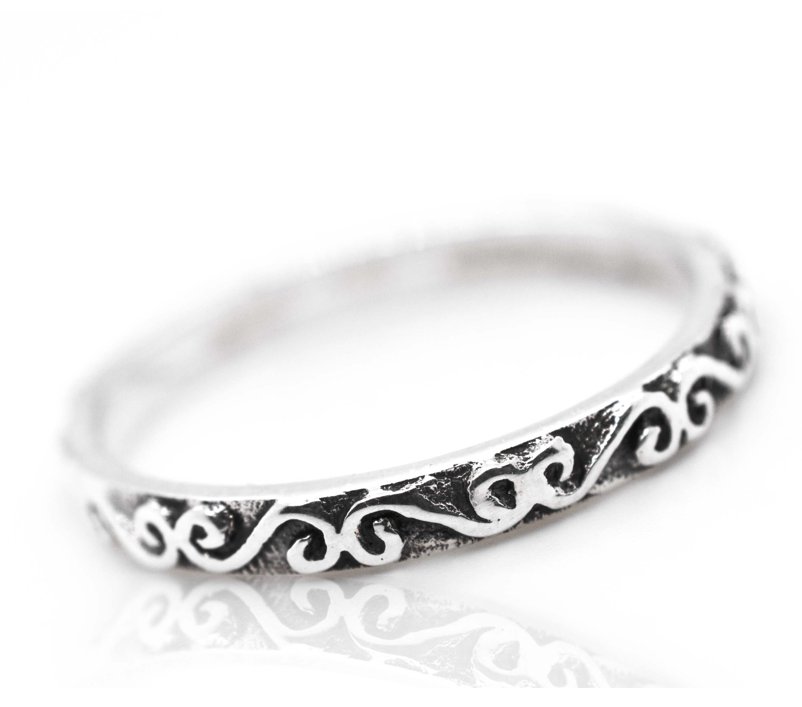 A Simple Band With Swirl Design by Super Silver.