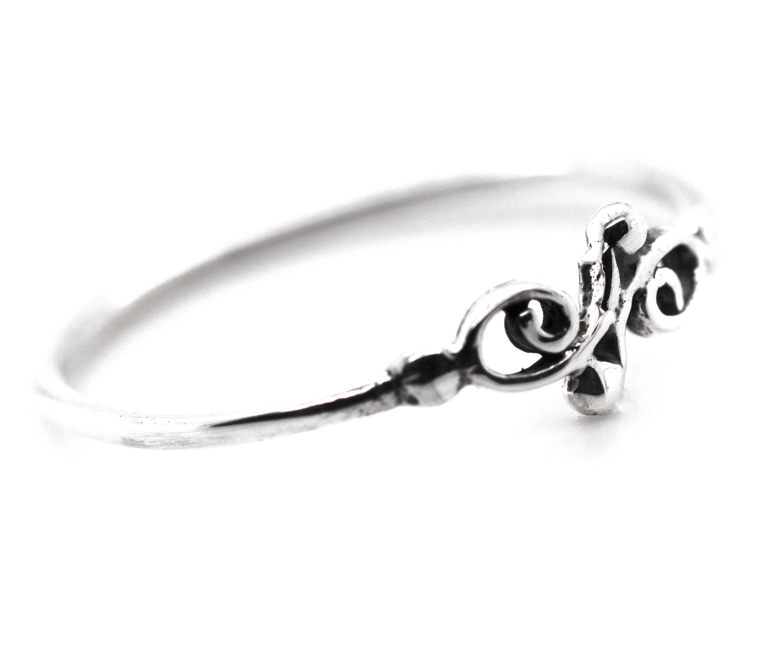 A Dainty Filigree Ring from Super Silver, with a swirl filigree design, perfect for day-to-day wear.