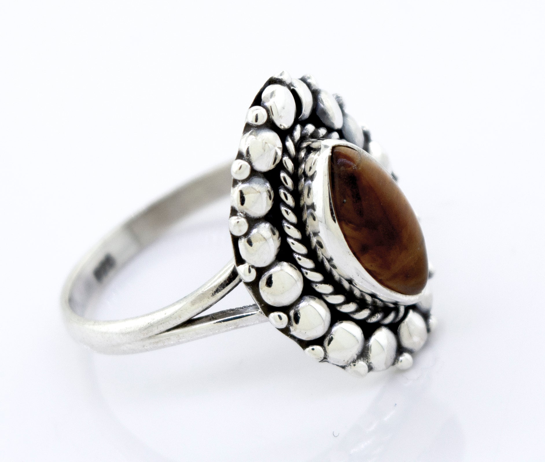 A beautiful Super Silver Marquise Shaped Vibrant Tiger's Eye Ring.