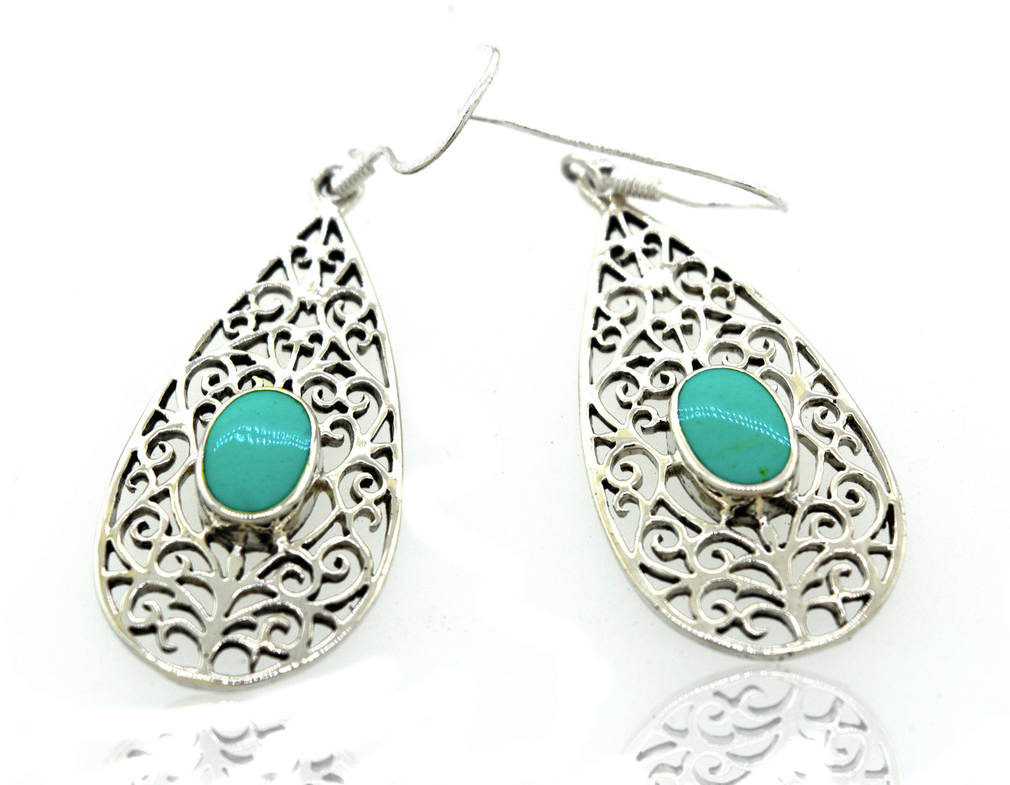 Super Silver presents the Elegant Teardrop Shape Turquoise Earrings featuring a teardrop-shaped turquoise stone and filigree design.