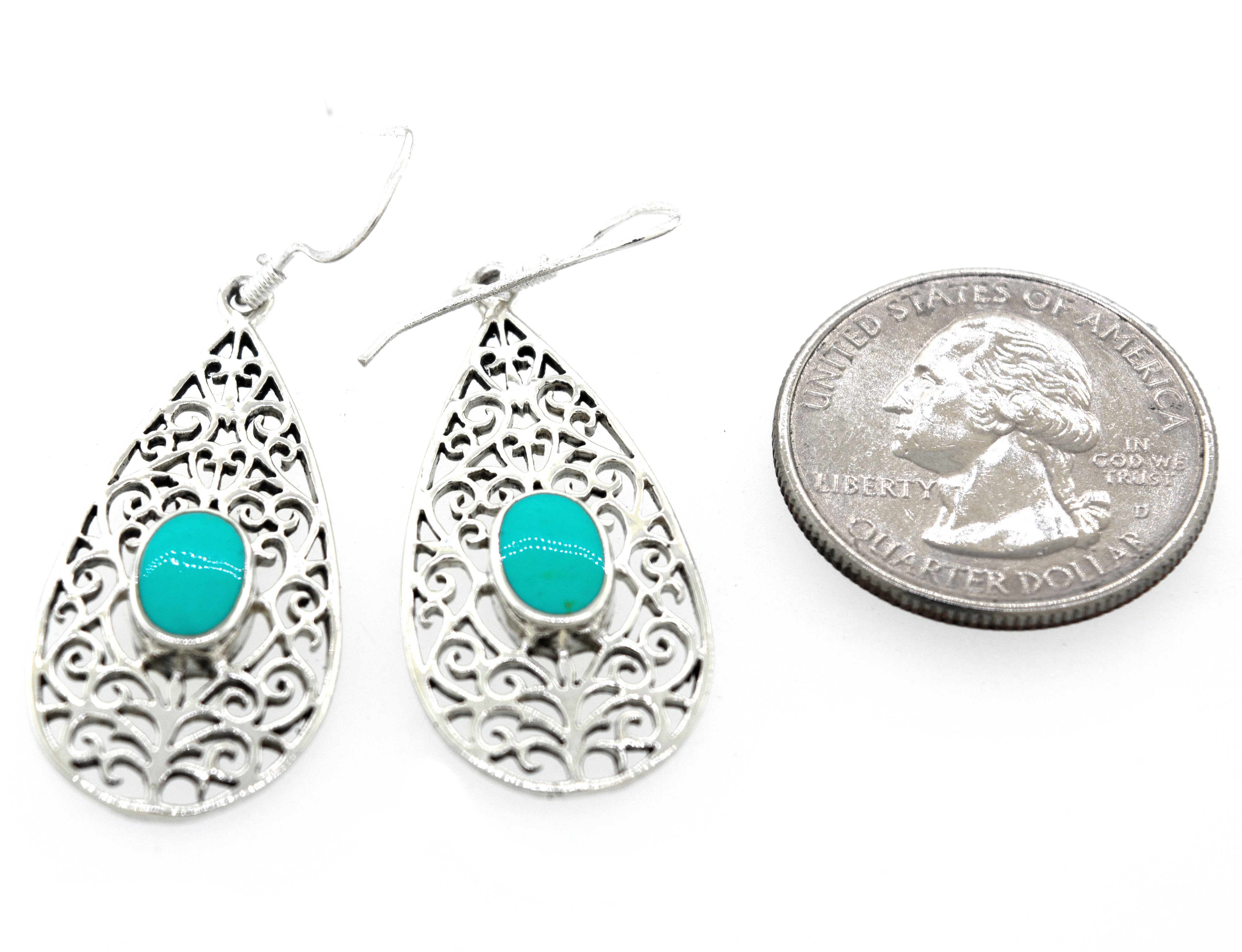 A pair of Super Silver Elegant Teardrop Shape Turquoise Earrings.