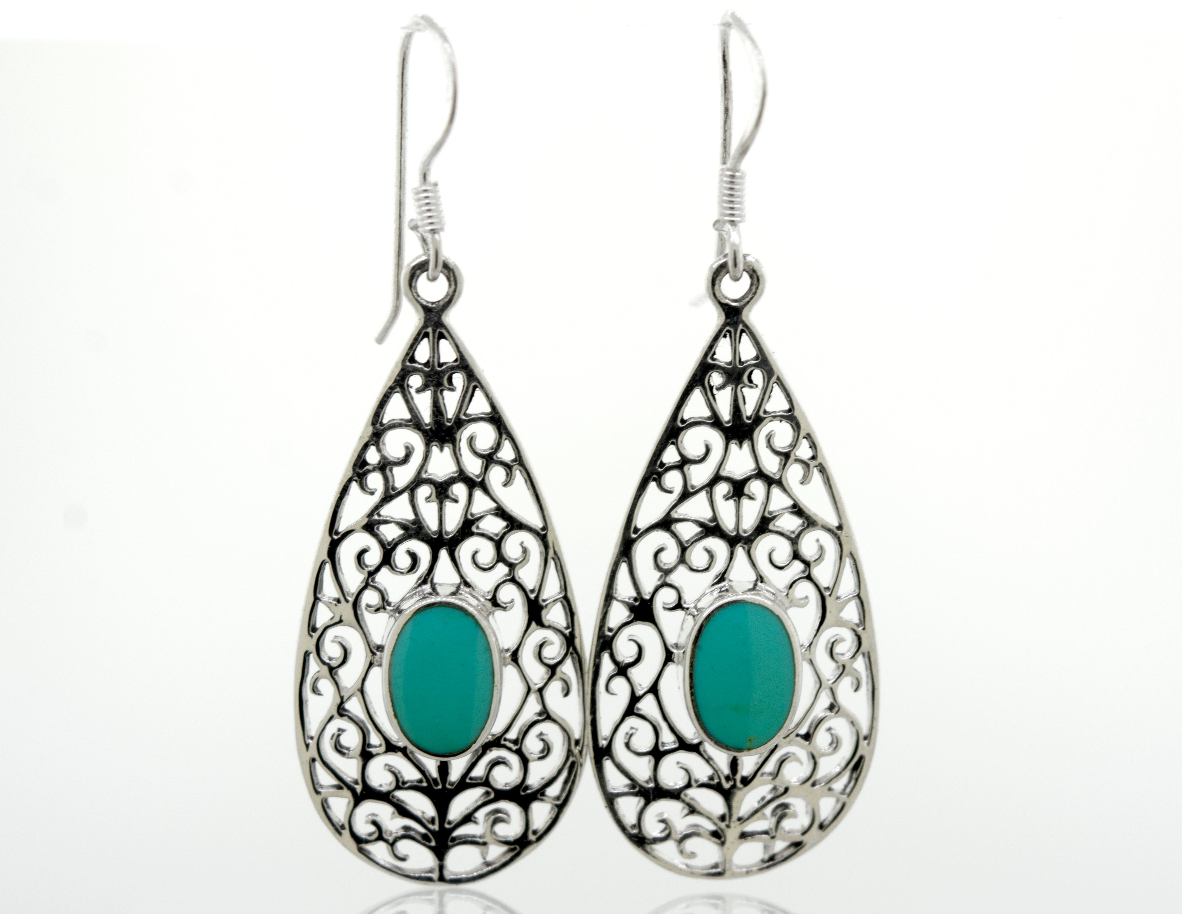 A pair of Elegant Teardrop Shape Turquoise Earrings with a filigree design, made from sterling silver, by Super Silver.