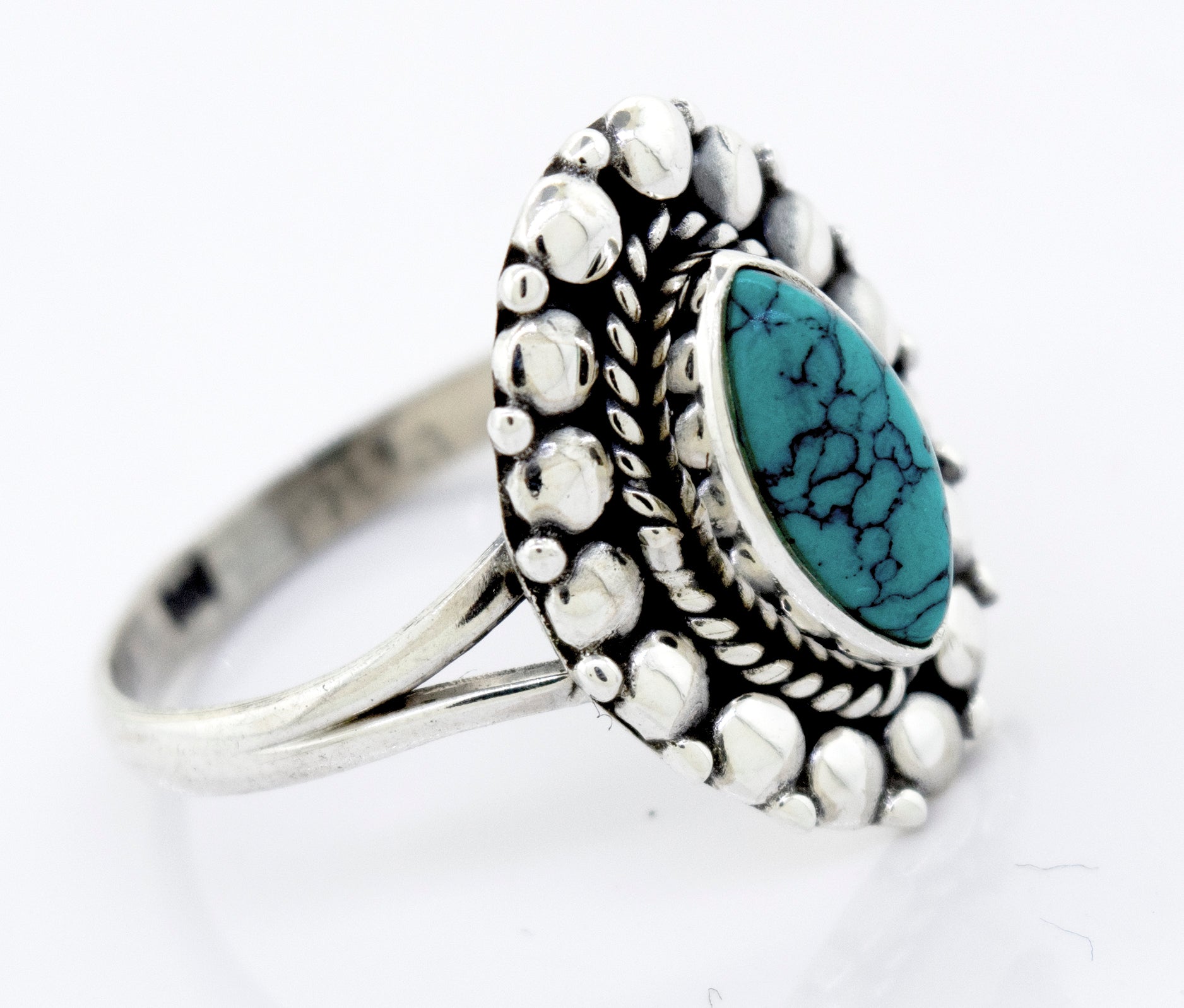 A Super Silver Marquise Shaped Vibrant Turquoise Stone Ring.