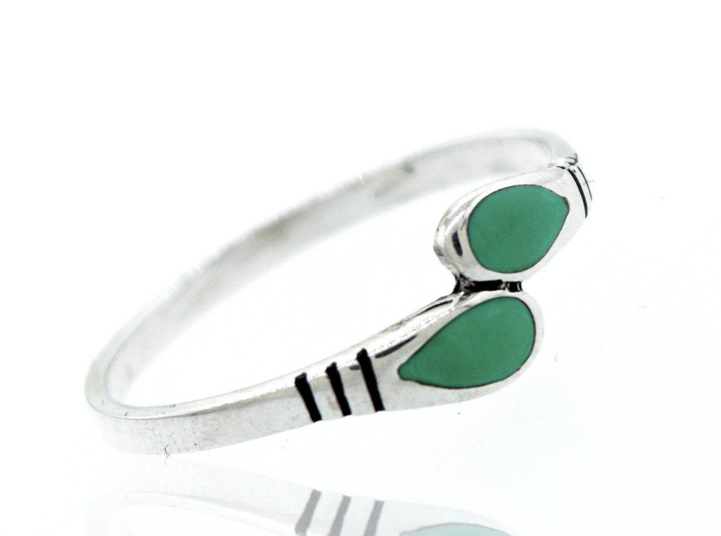 An elegant Super Silver ring with two Green Turquoise Teardrop Shape stones.