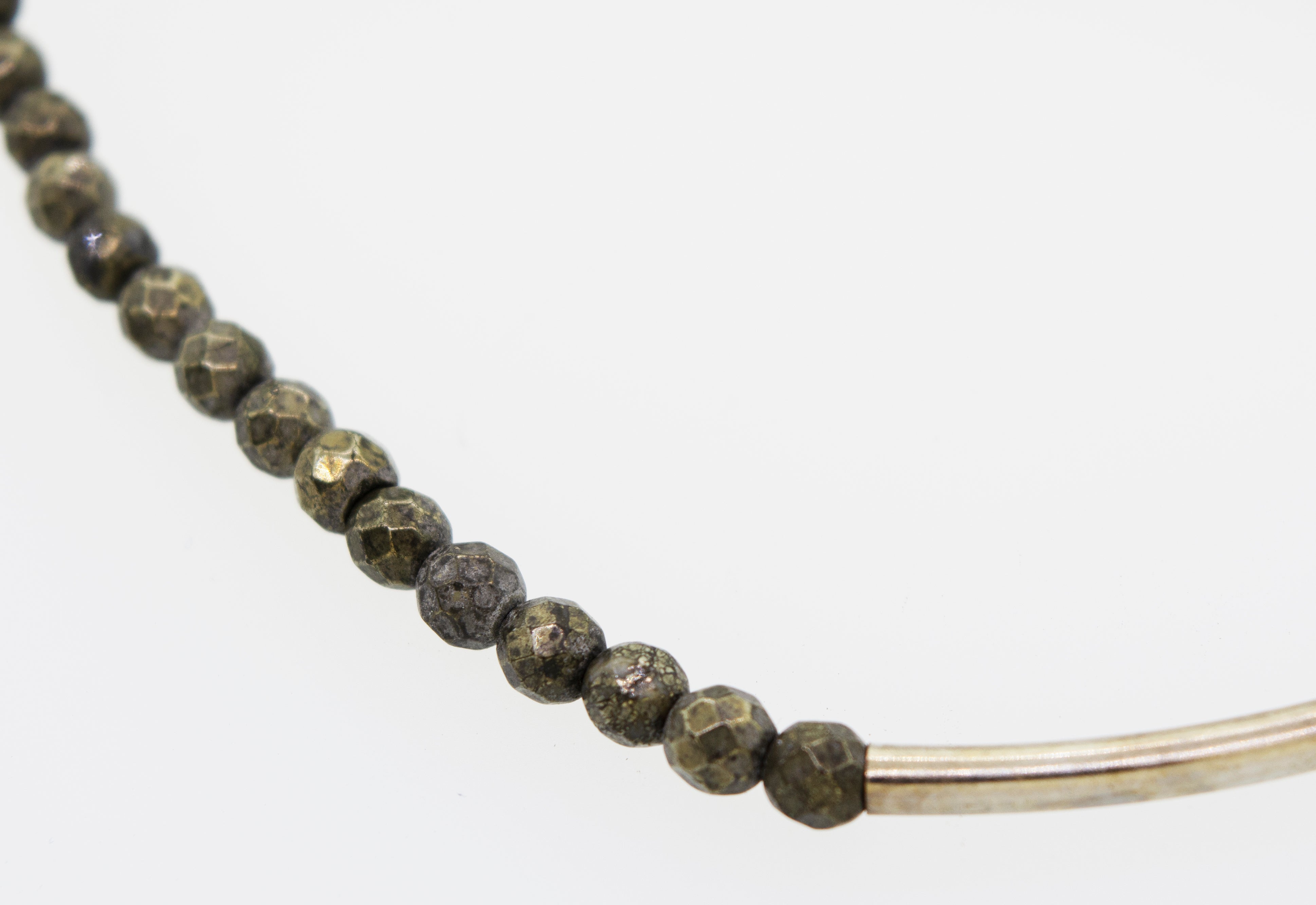 An Adjustable Gemstone Bead Bracelet by Super Silver, offering versatile style.
