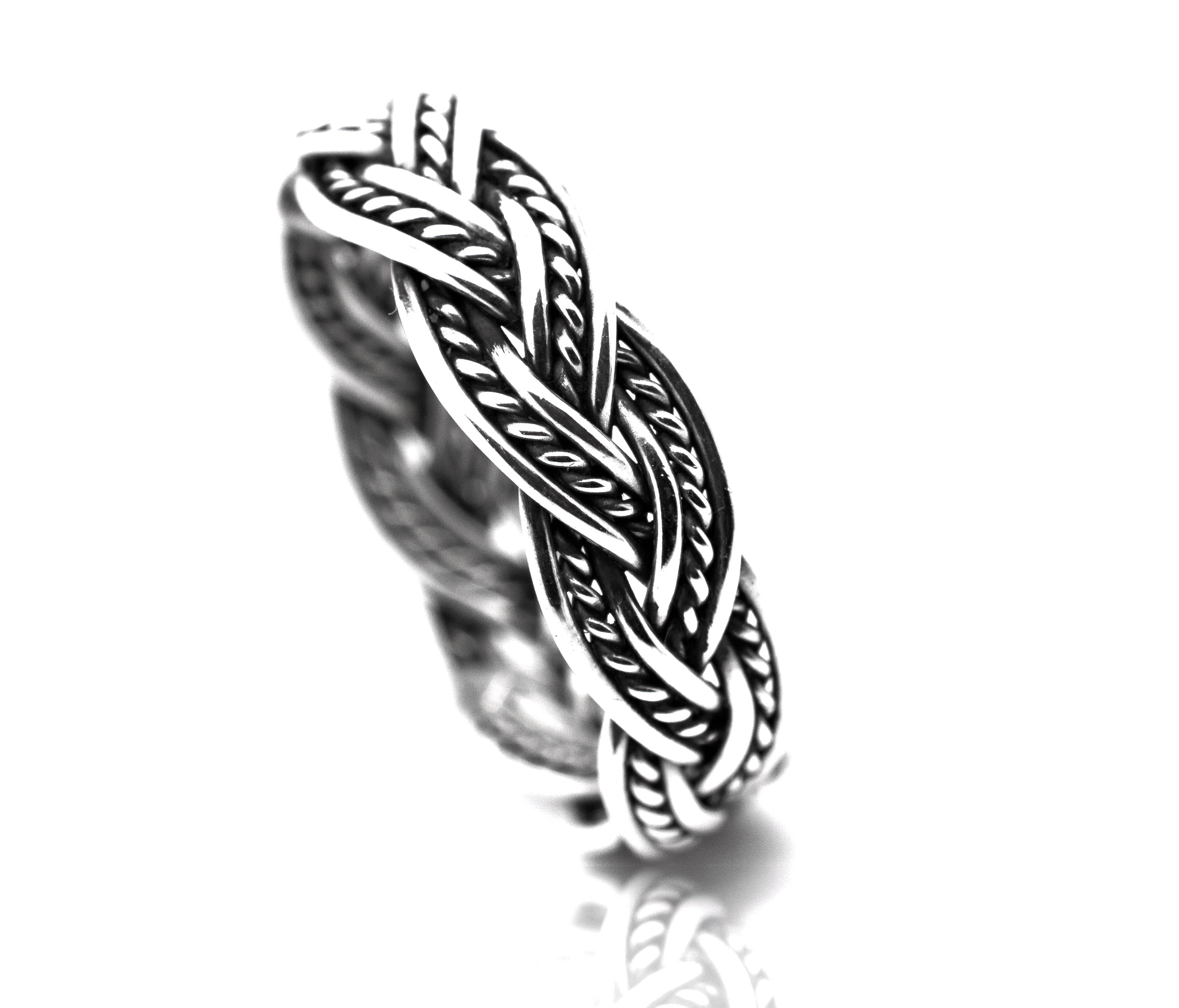 An intricately braided Super Silver Twisting Rope Band with a textured design.