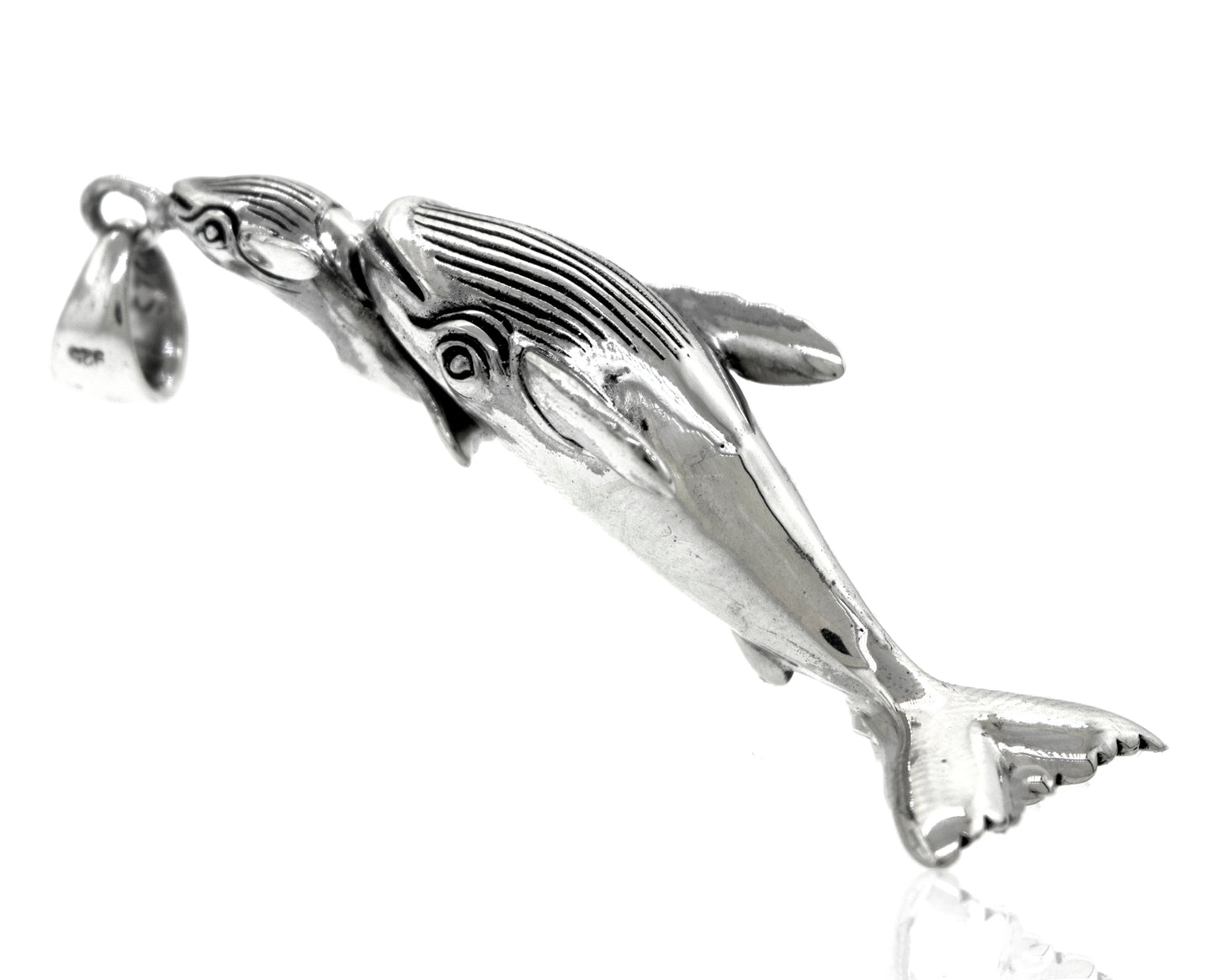 A Super Silver Handcrafted Whale And Calf Pendant on a white background.