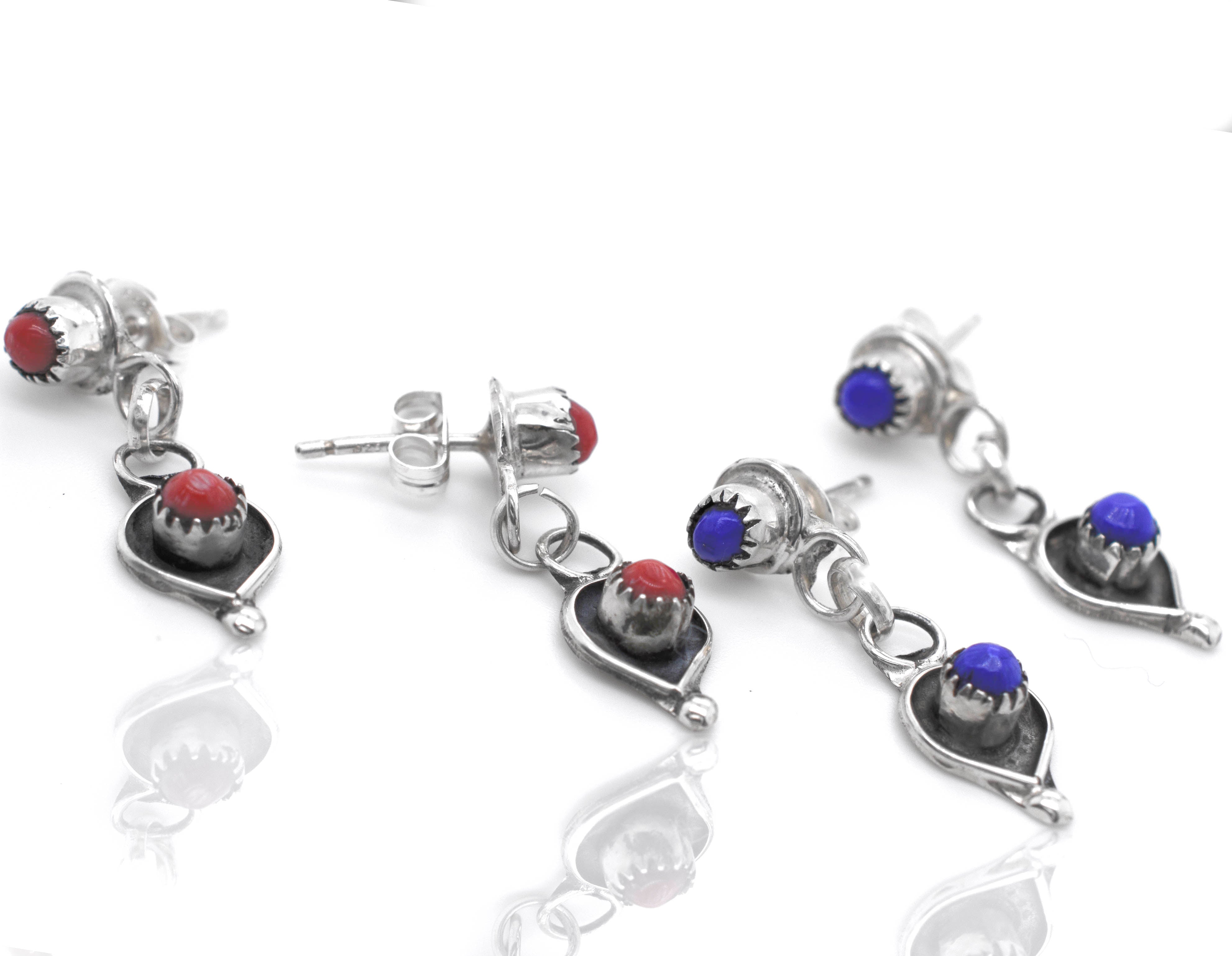 Handmade Super Silver Zuni earrings crafted from .925 sterling silver with lapis and coral stones.