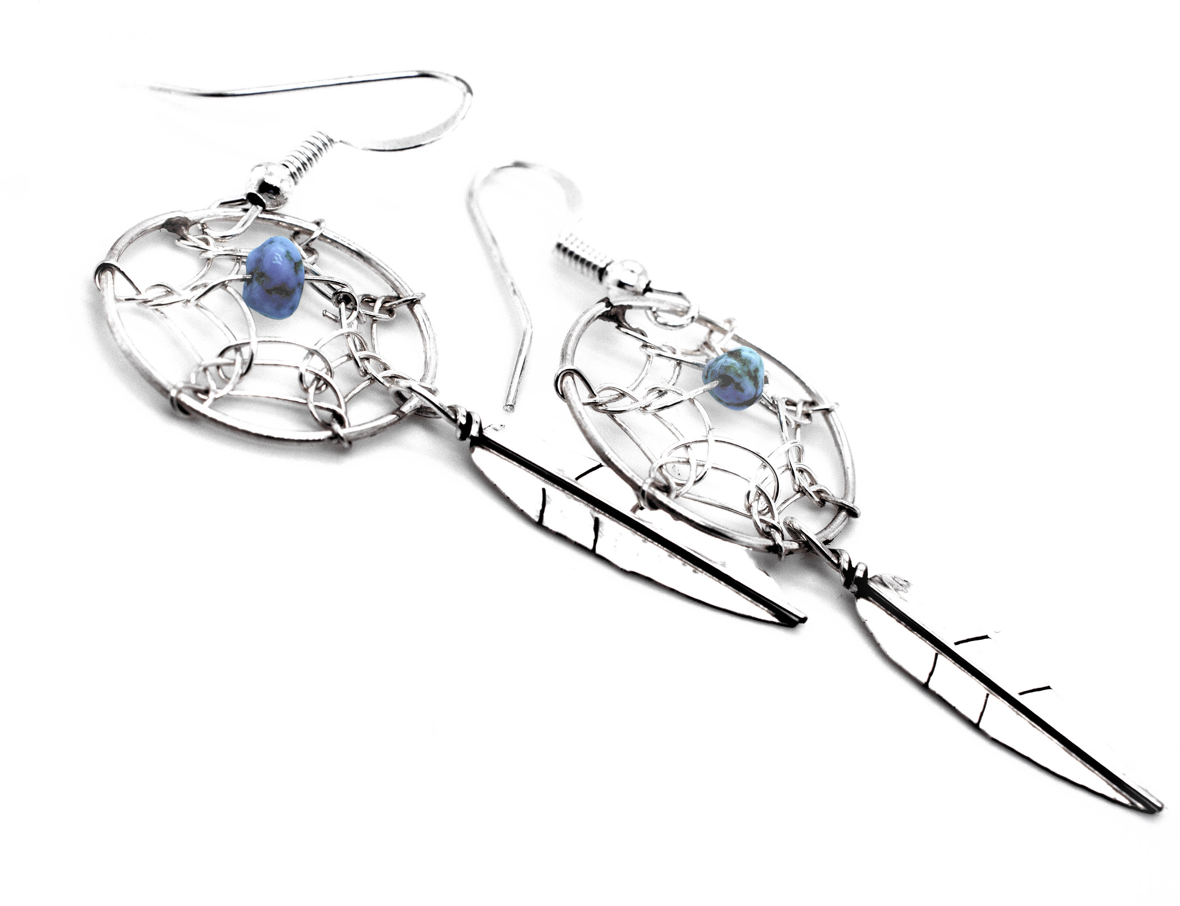 A pair of Super Silver Zuni Dreamcatcher Earrings with Natural Stone Bead.
