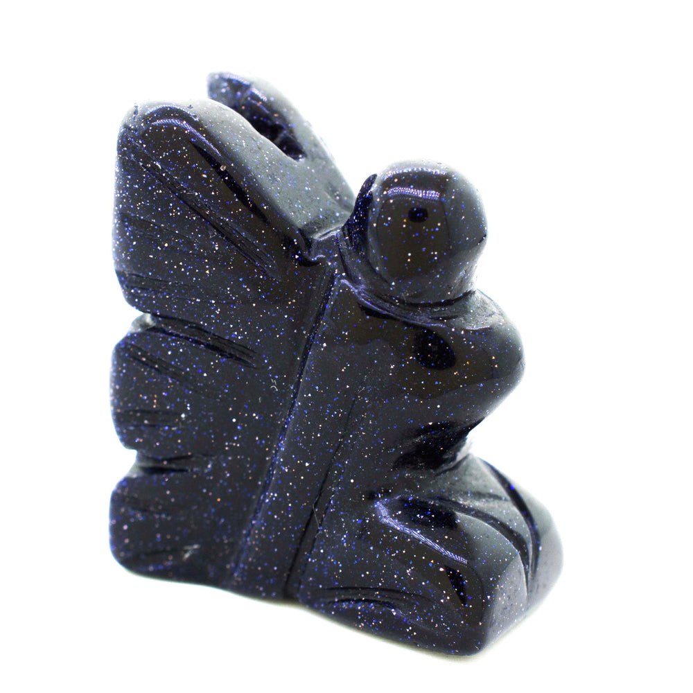 
                  
                    A Carved Fairy Gemstones Figure with a butterfly on it, giving off a whimsical and cottagecore vibe.
                  
                