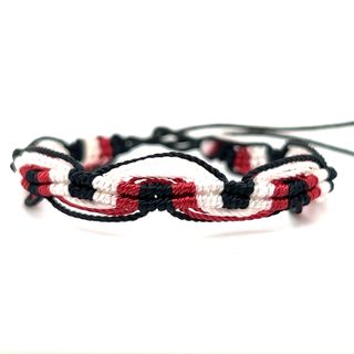 
                  
                    An everyday style adjustable Colorful Friendship Bracelet with bright red, white, and blue threads from Super Silver.
                  
                
