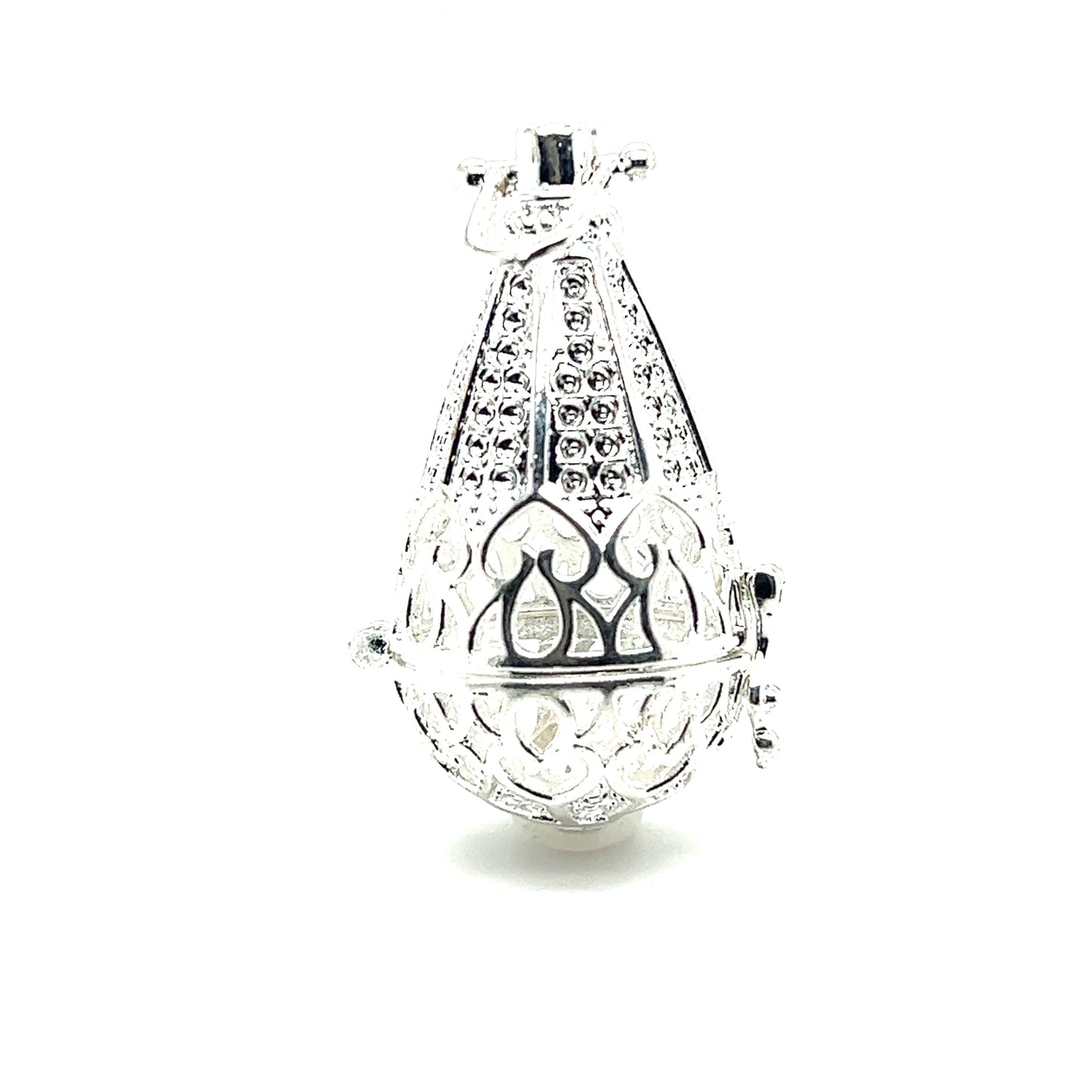 
                  
                    An ornate silver Filigree Cage Pendant with a boho vibe and Super Silver brand design.
                  
                