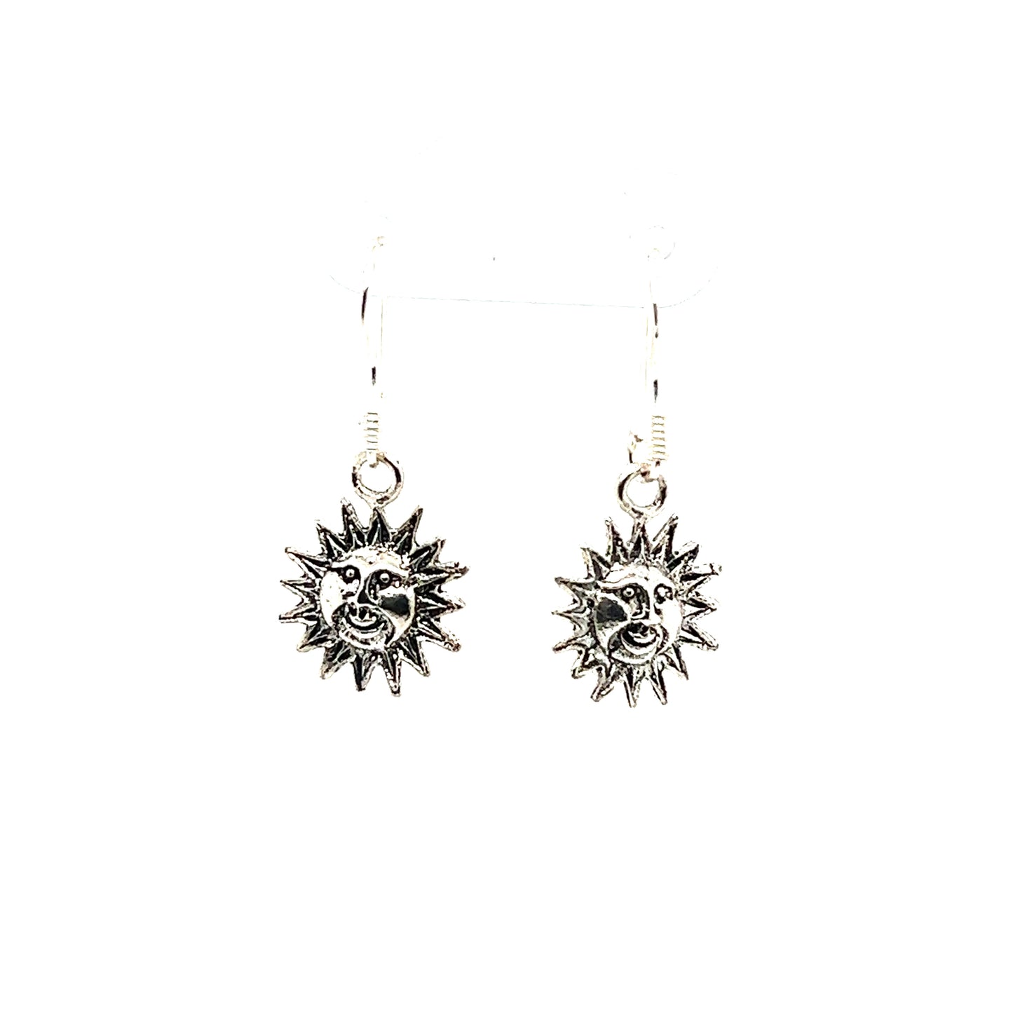 
                  
                    A pair of Small Sun with Face Earrings from Super Silver with an oxidized finish on a white background.
                  
                