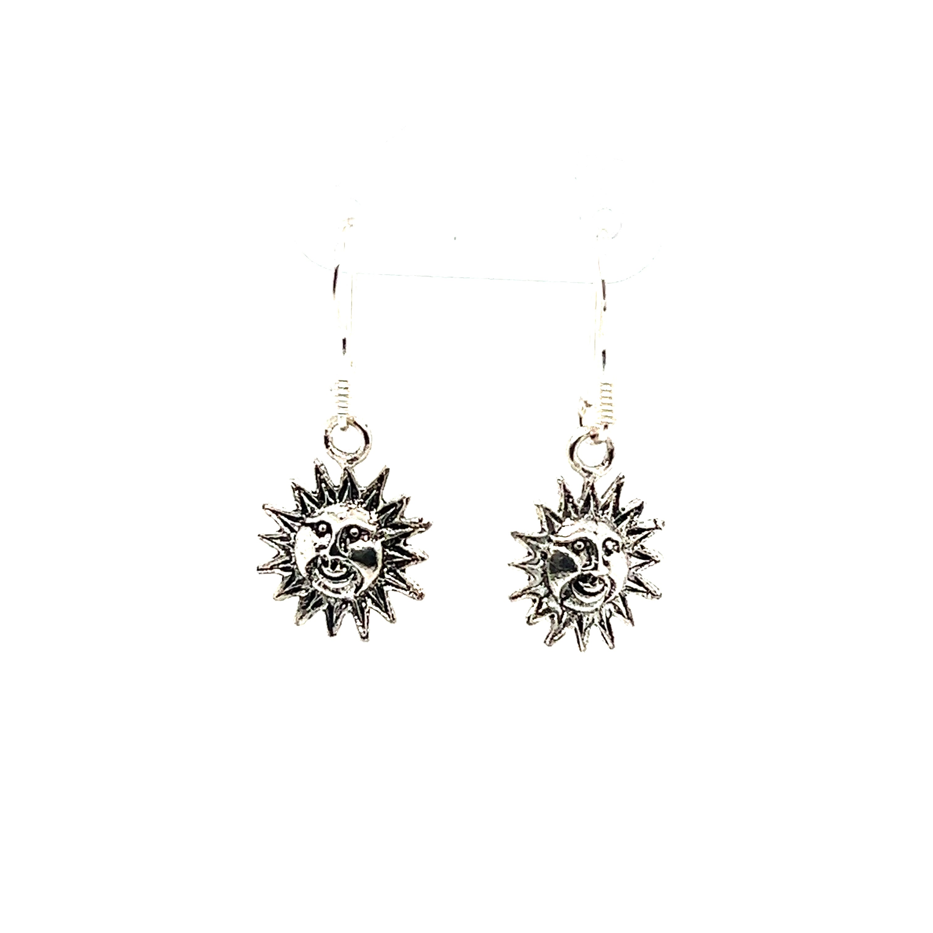 A pair of Small Sun with Face Earrings from Super Silver with an oxidized finish on a white background.