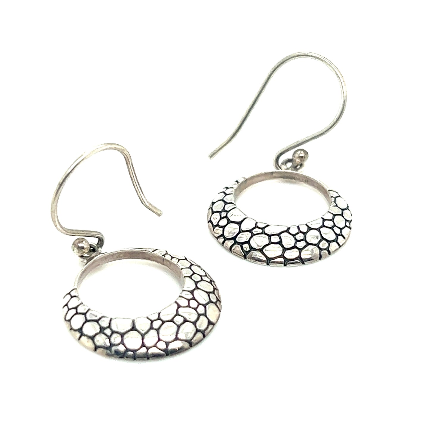 These Super Silver Cobblestone Circle Earrings combine modern charm with urban elegance, featuring a mesmerizing black and white pattern.