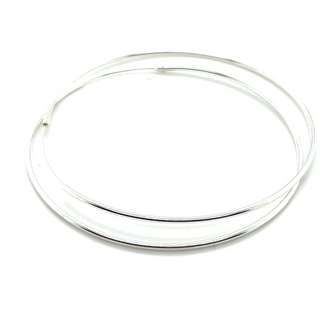 The 1.2mm Infinity Hoops, expertly crafted from .925 Sterling Silver, elegantly rest on a white background. Their timeless design adds a touch of sophistication to any ensemble.