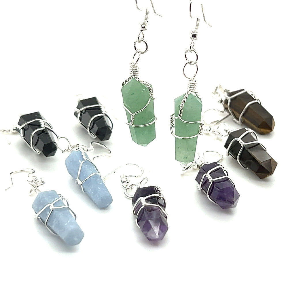 A set of Super Silver Wire Wrapped Stone Earrings in mixed metal.
