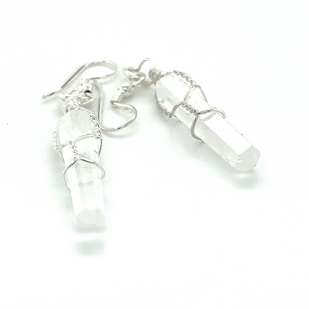 
                  
                    A pair of Super Silver Wire Wrapped Stone Earrings with genuine clear quartz crystals suitable for everyday wear.
                  
                