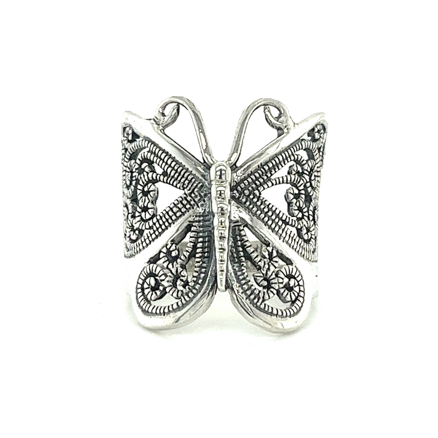 
                  
                    A minimalist Large Silver Butterfly Ring with filigree detailing on a white background.
                  
                