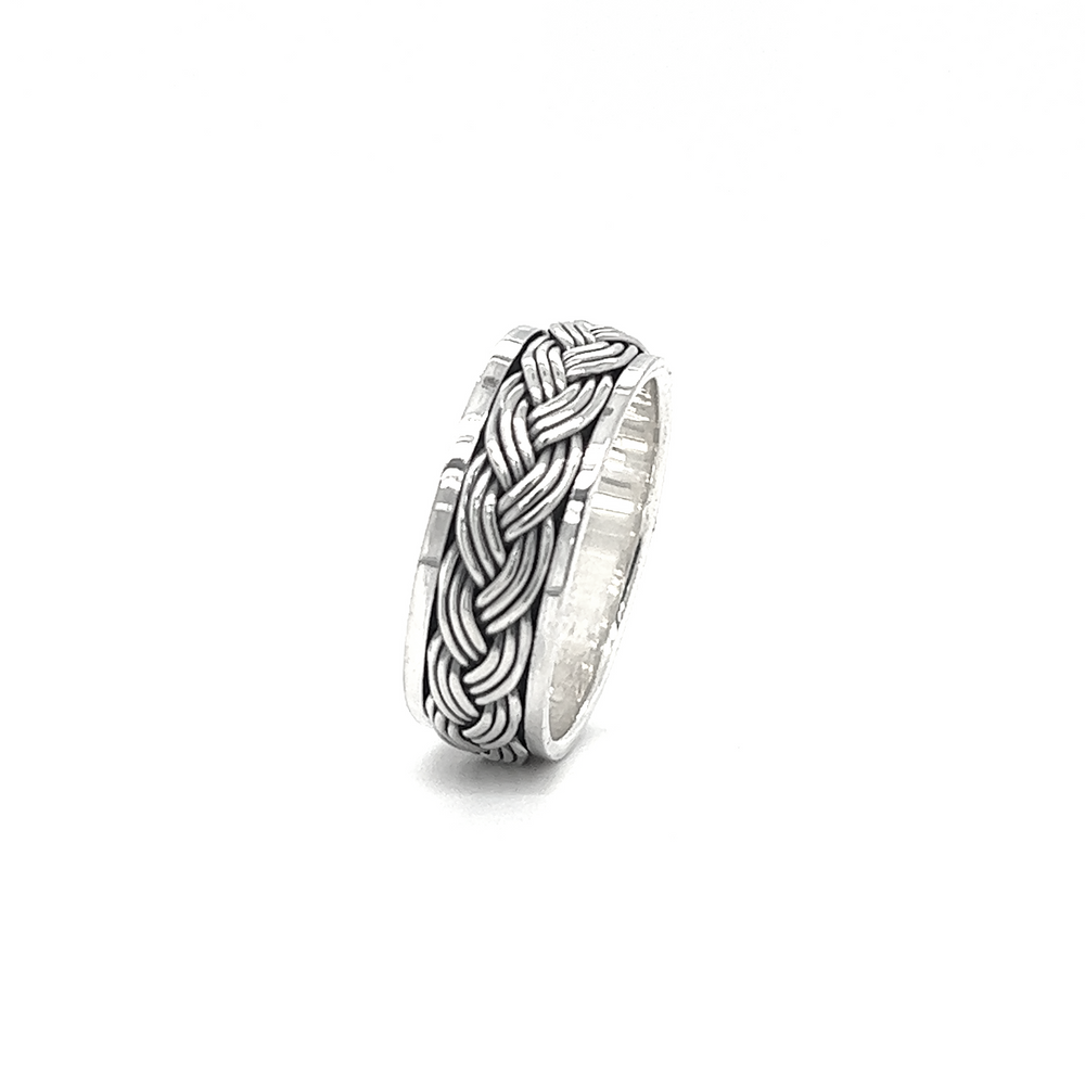 
                  
                    A silver Rope Spinner Ring with a braided weave design.
                  
                