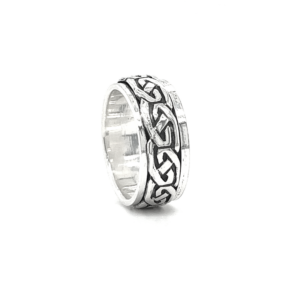 
                  
                    A discreet Spinner Band With Celtic Design.
                  
                