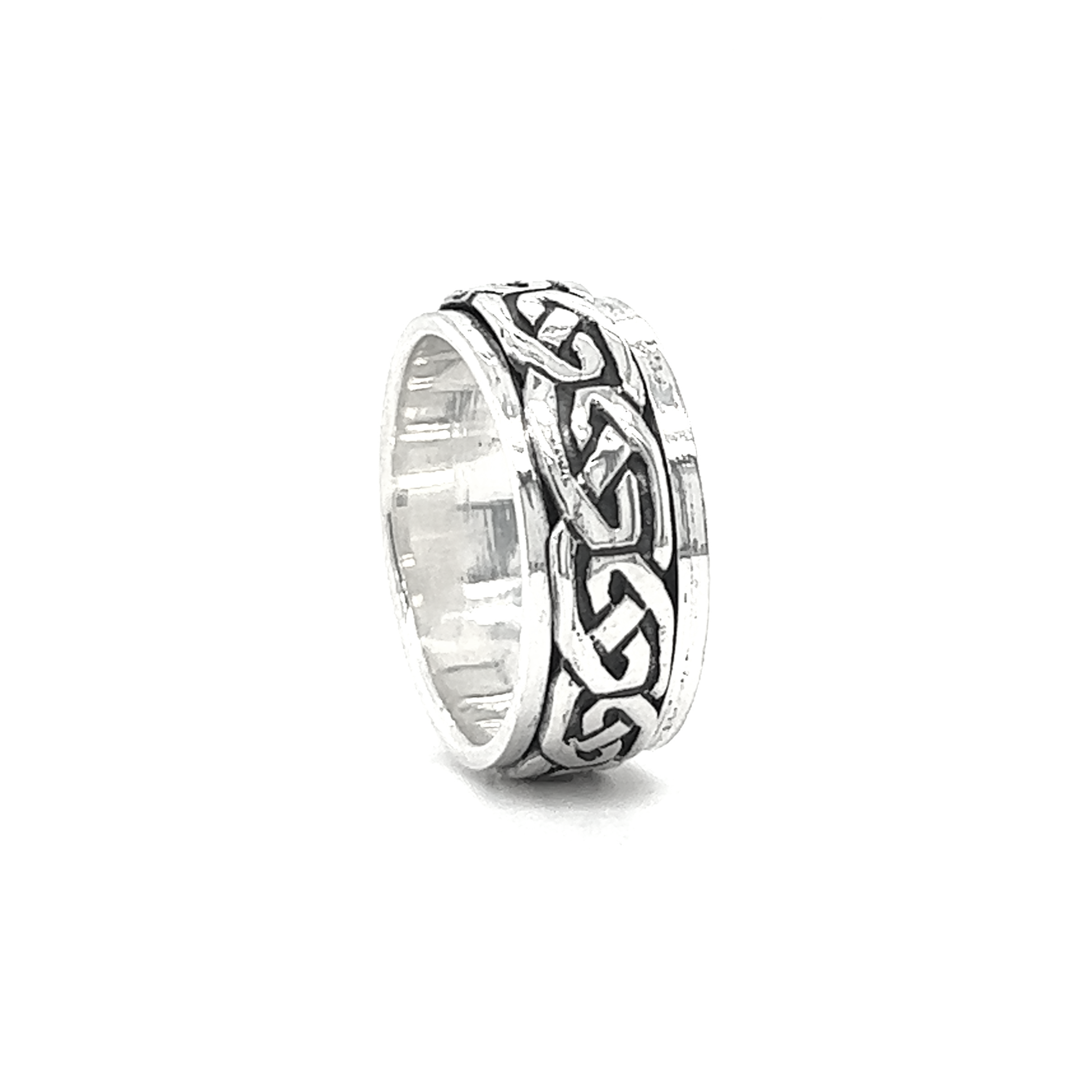 A discreet Spinner Band With Celtic Design.