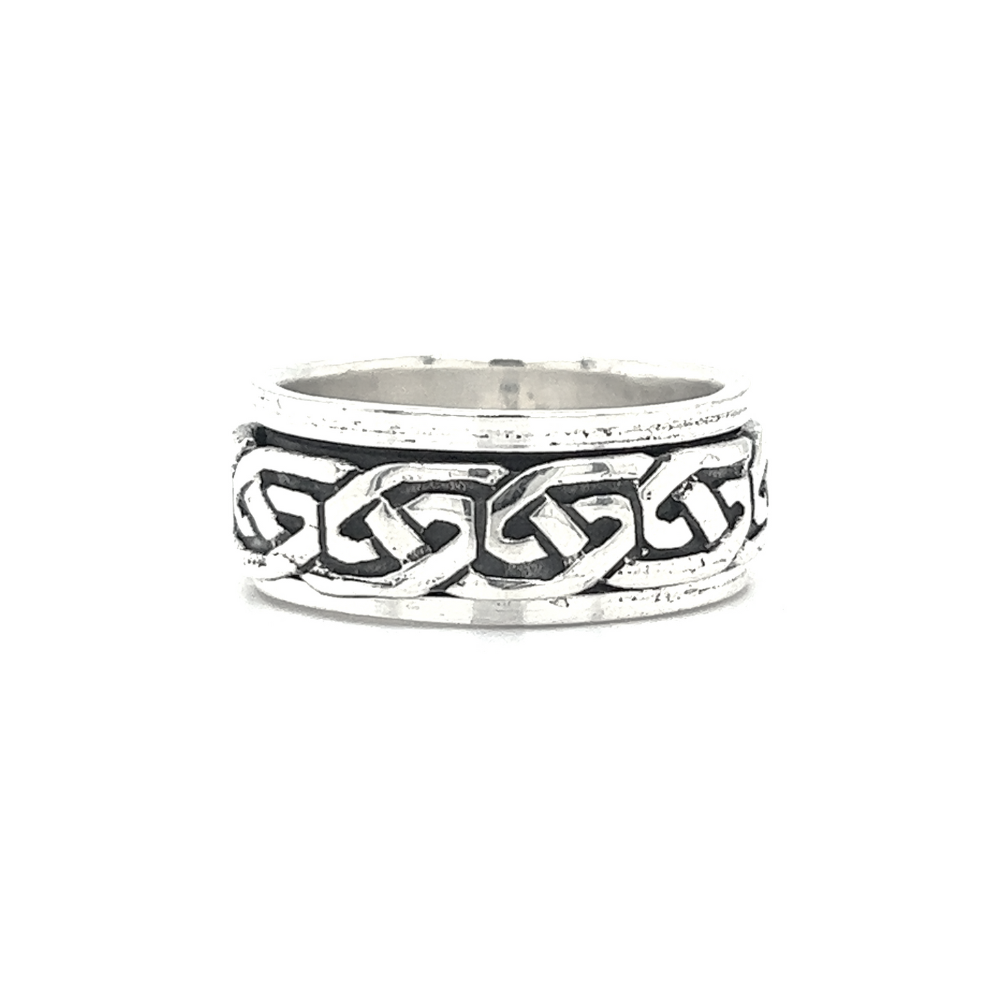 A silver Spinner Band With Celtic Design.
