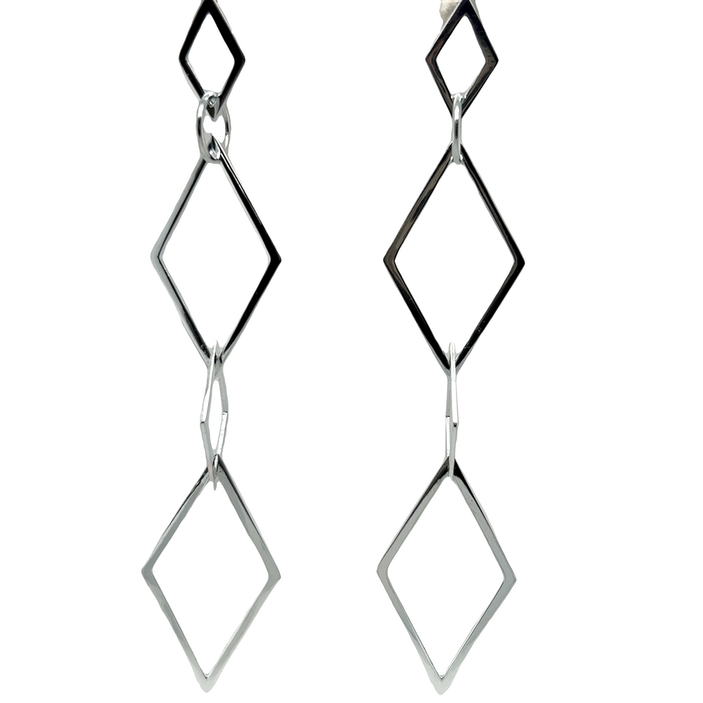 A pair of Super Silver Long Interconnected Diamond Shaped Earrings, exuding contemporary elegance.
