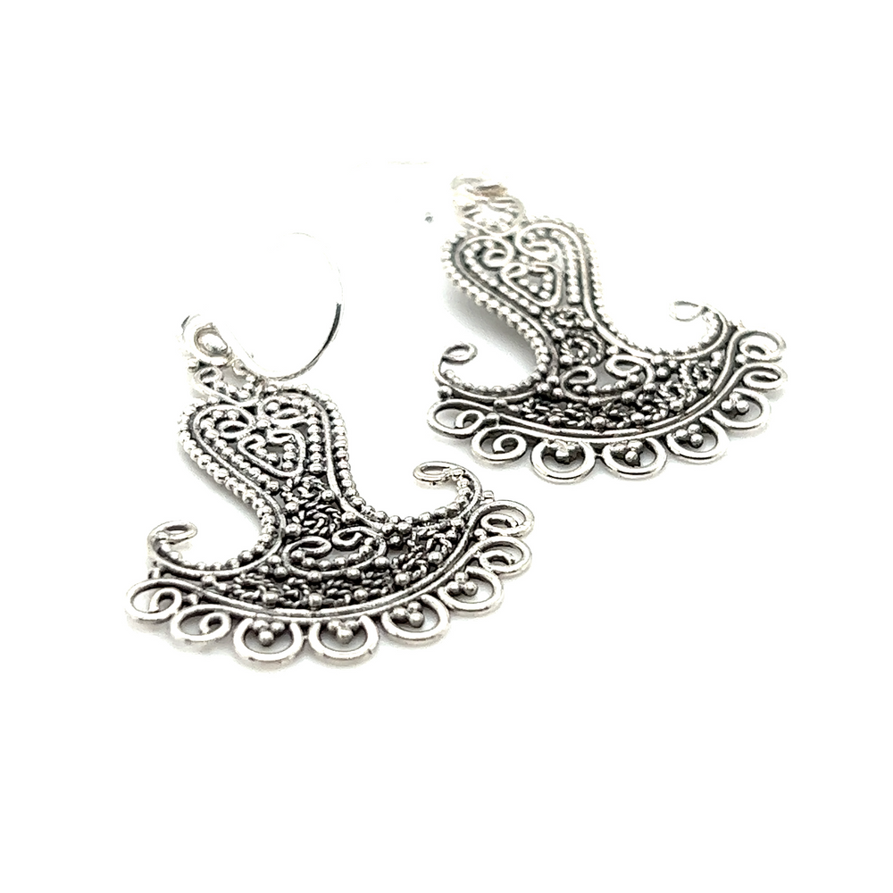 A pair of Super Silver Handmade Bali Freeform Statement Earrings with ornate designs inspired by Bali.