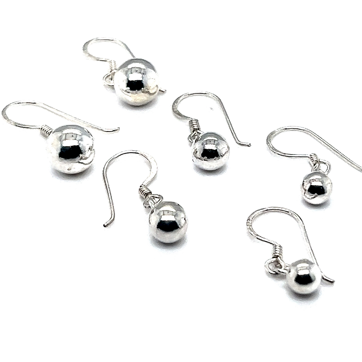 Super Silver's Simple Dangling Ball Earrings, on a white background, exuding understated glamour.