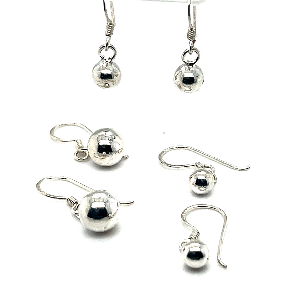 Super Silver's Simple Dangling Ball Earring set offers understated glamour.