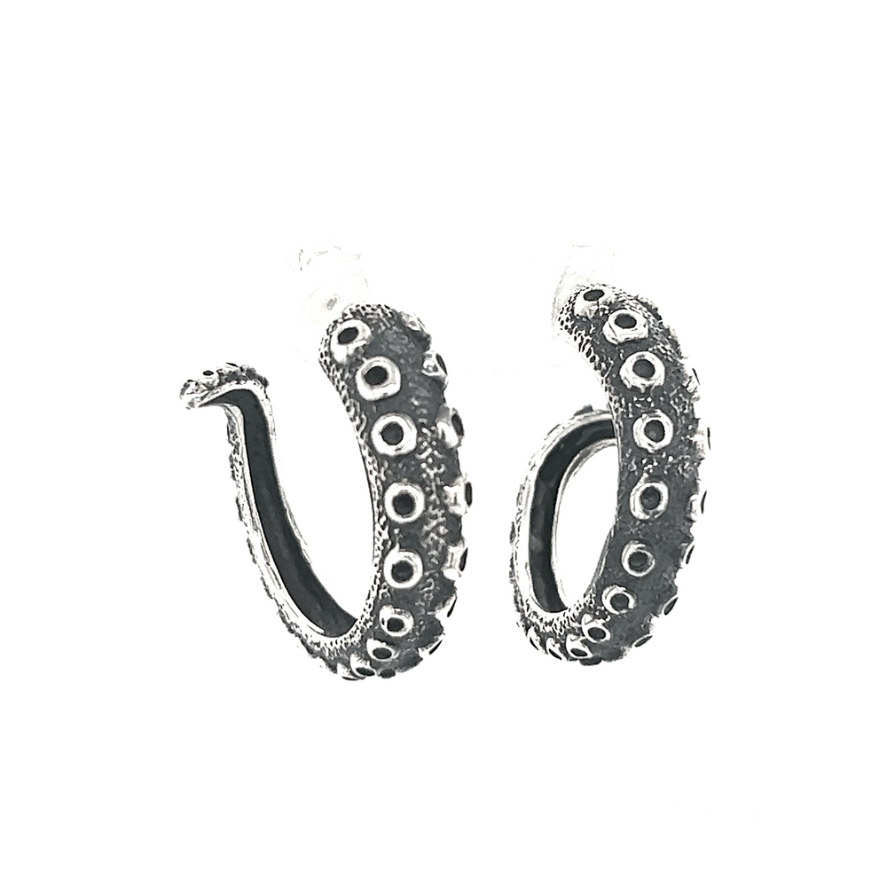 
                  
                    A pair of Super Silver Edgy Octopus Tentacle Hoop Earrings on a white background.
                  
                