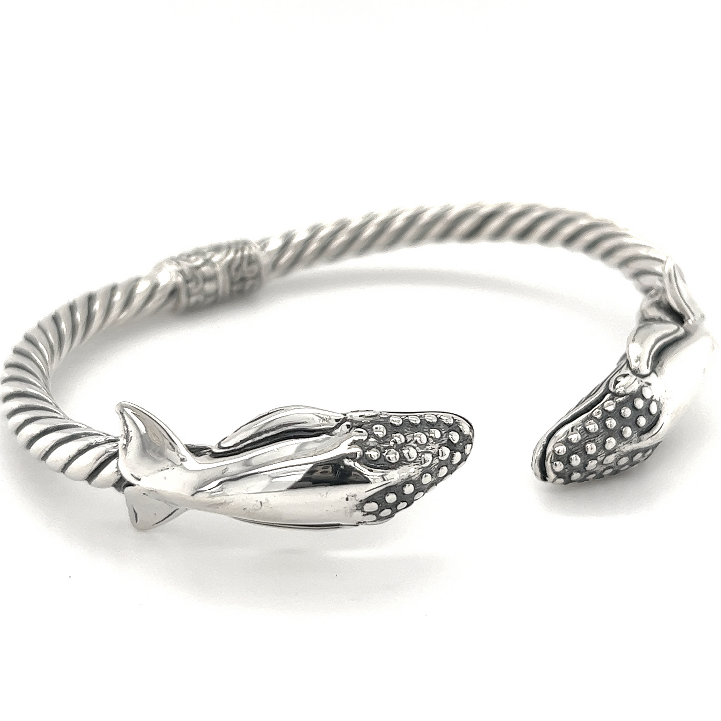 
                  
                    A Super Silver Exquisite Whale Hinge Bracelet with two dolphins on it.
                  
                